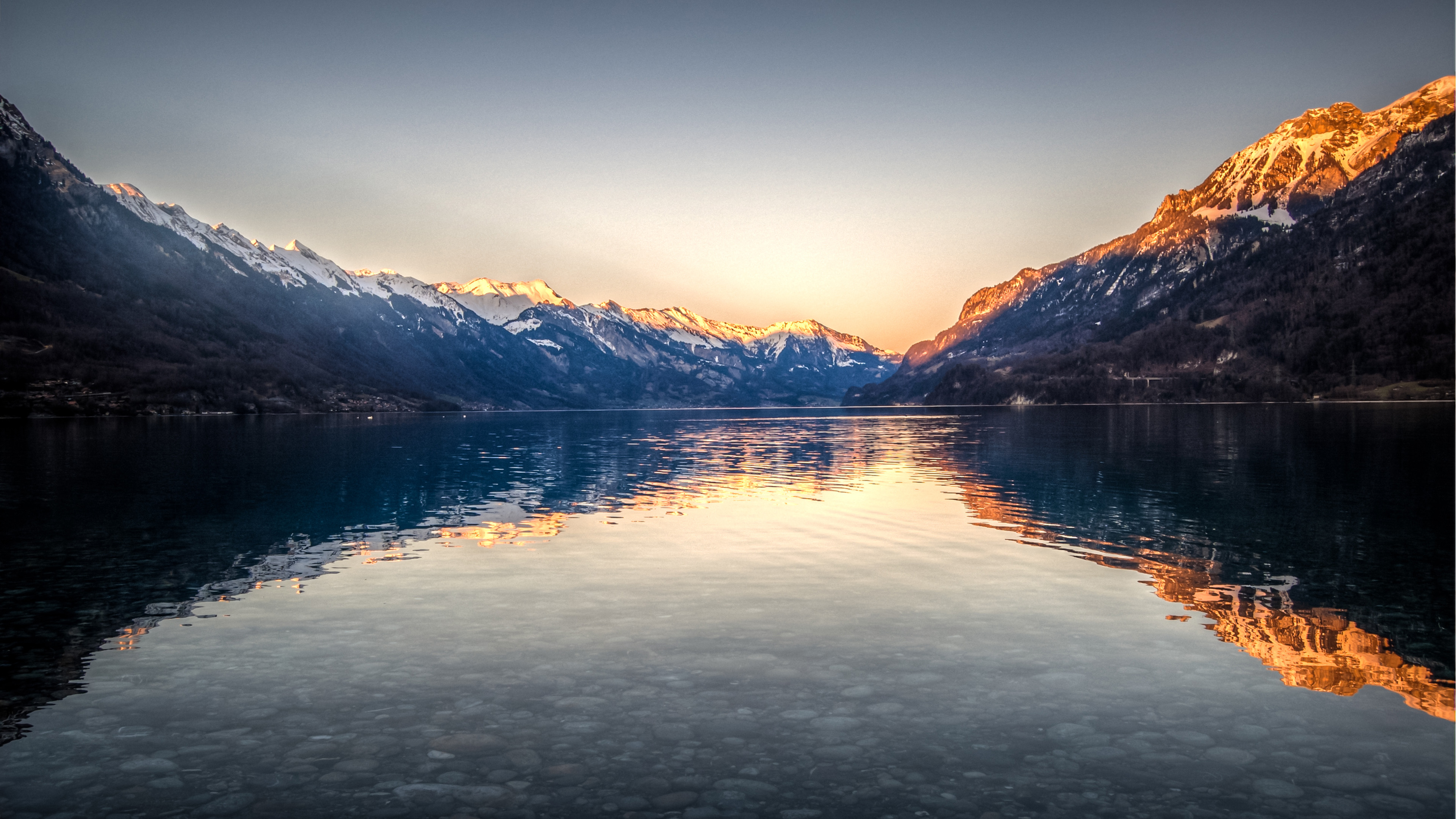 Lake Brienz, Switzerland at sunset with mountain reflections HD Wallpaper