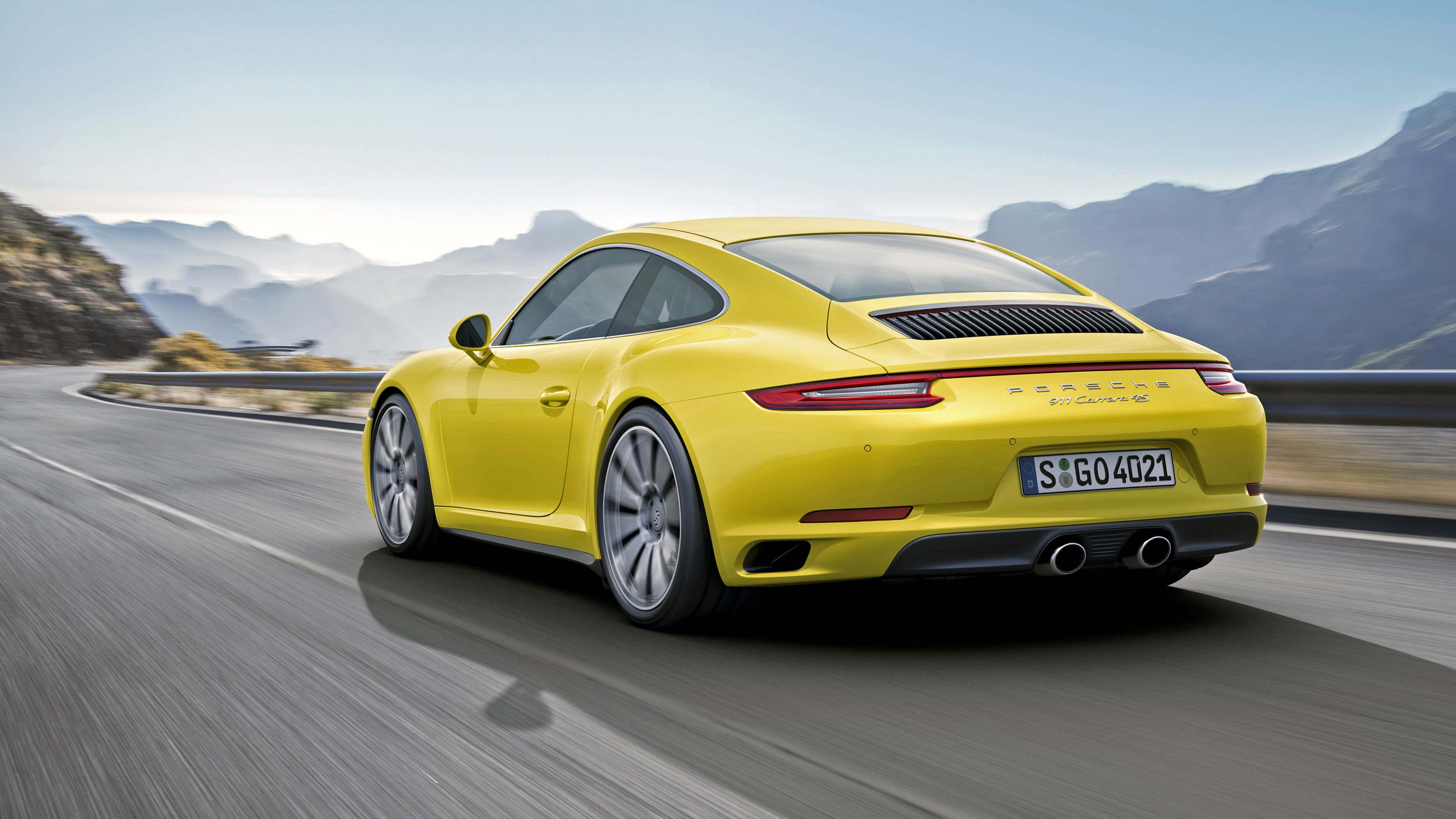 Yellow Porsche 911 Carrera 4S on a Mountain Road HD Wallpaper
