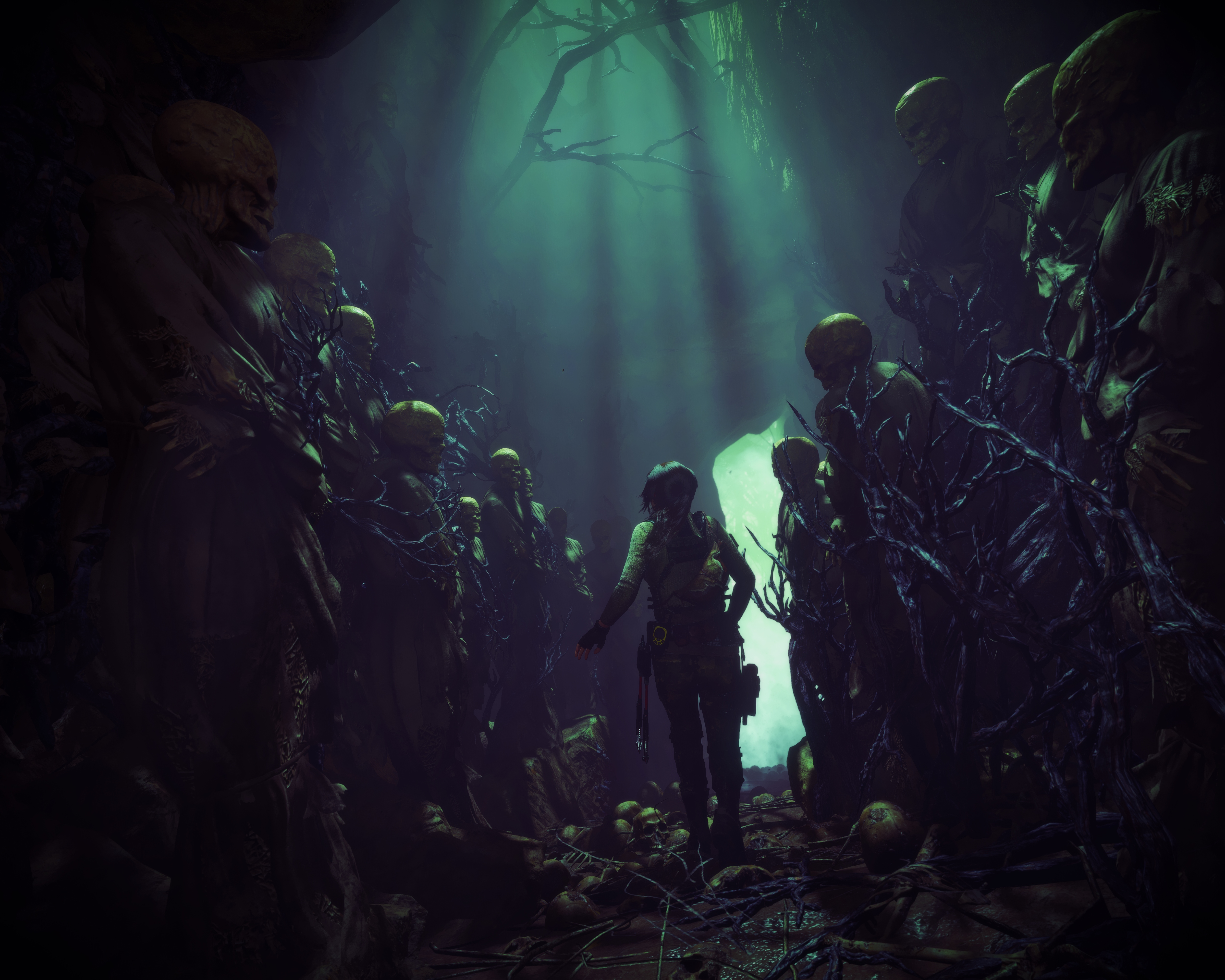 Lara Croft in a forest of skulls from Rise of the Tomb Raider 4K HD Wallpaper