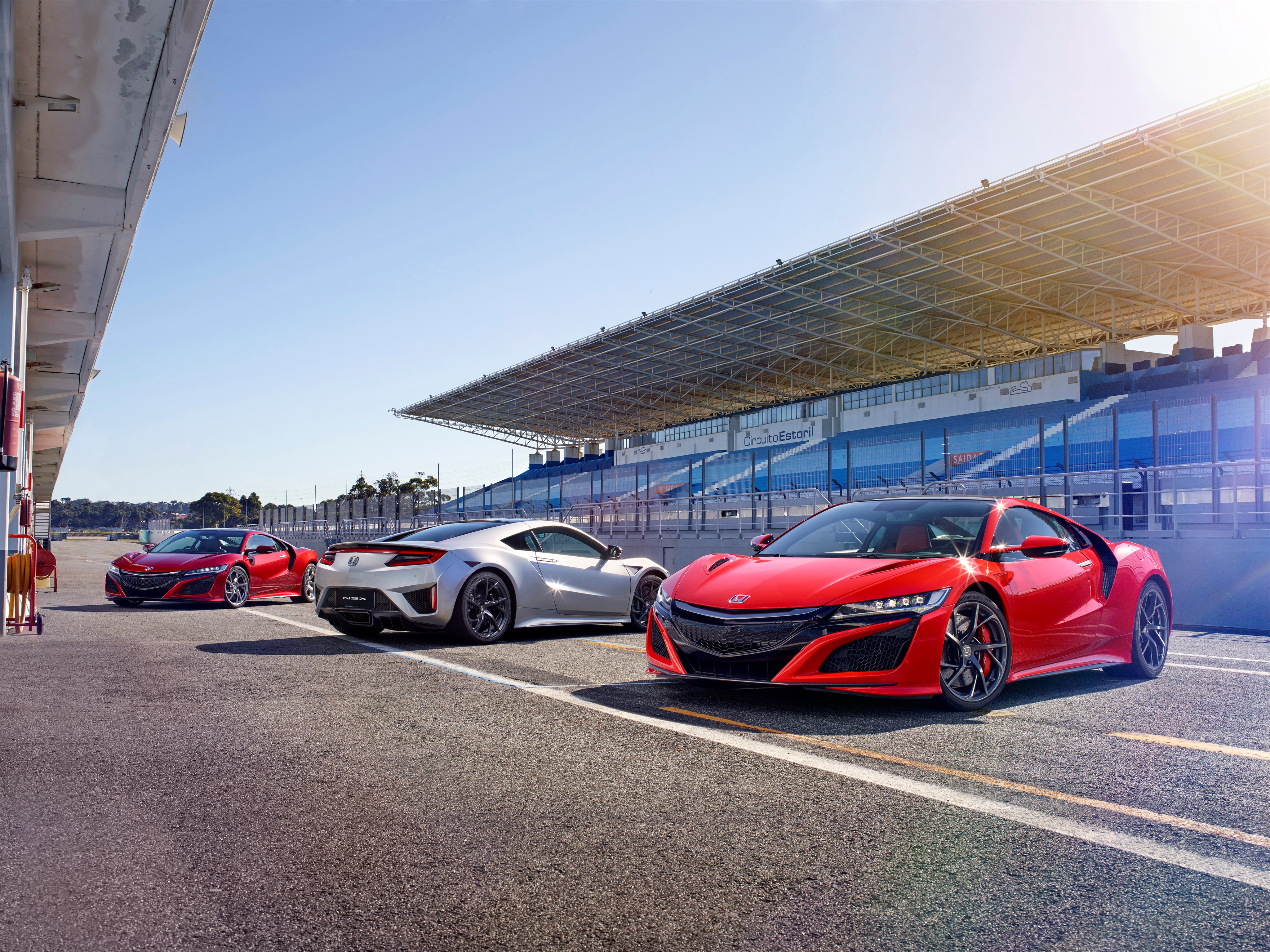 Honda NSX cars on a race track HD Wallpaper