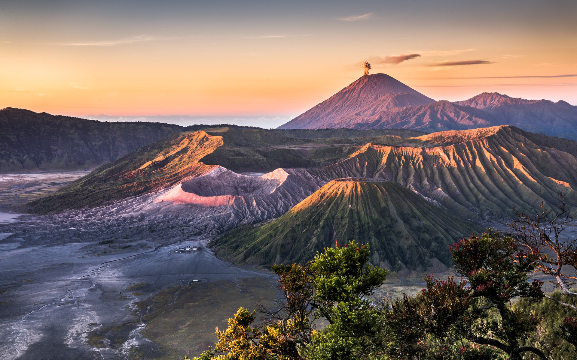 Mount Bromo volcano erupting at sunrise HD Wallpaper