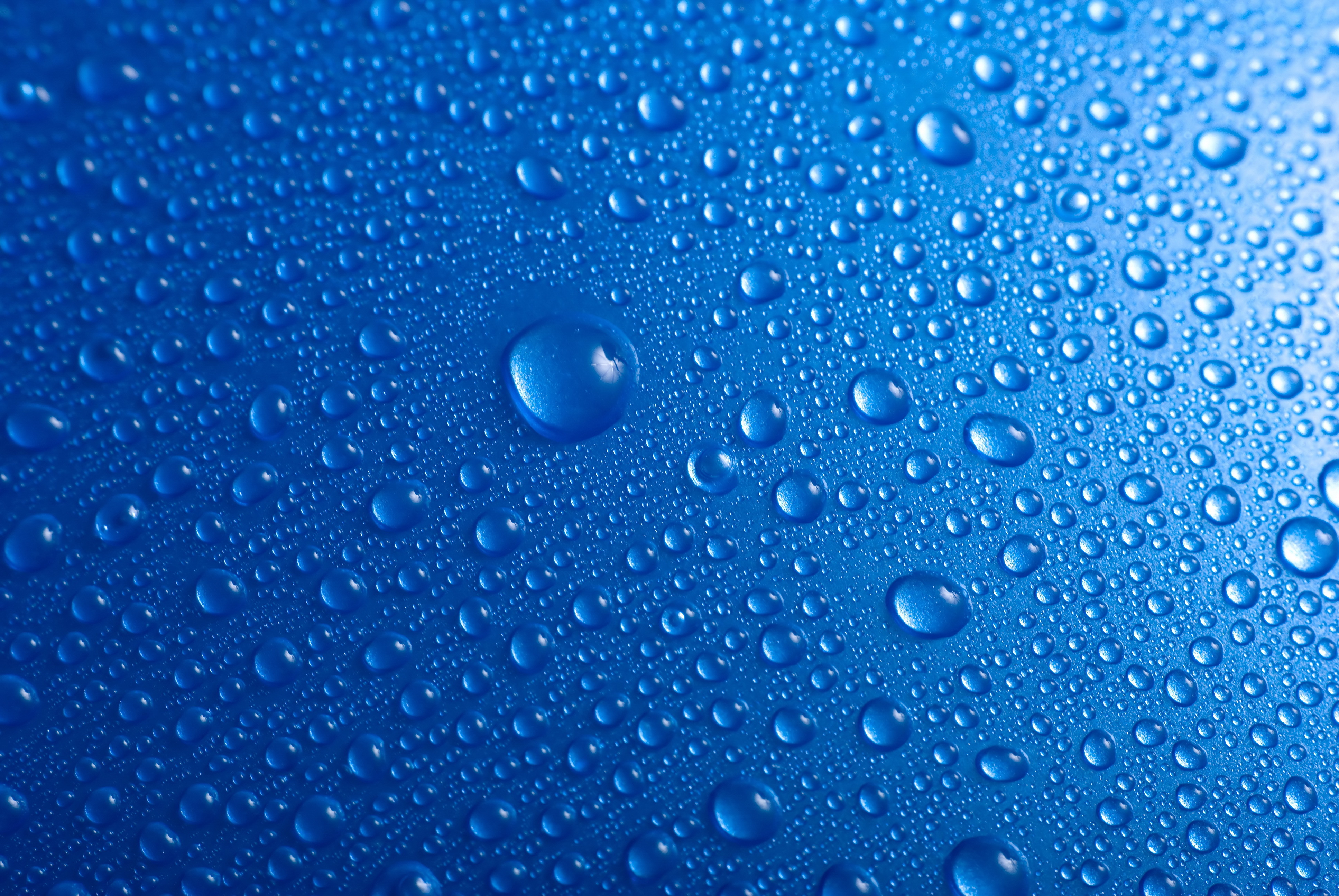 Blue background with water droplets HD Wallpaper