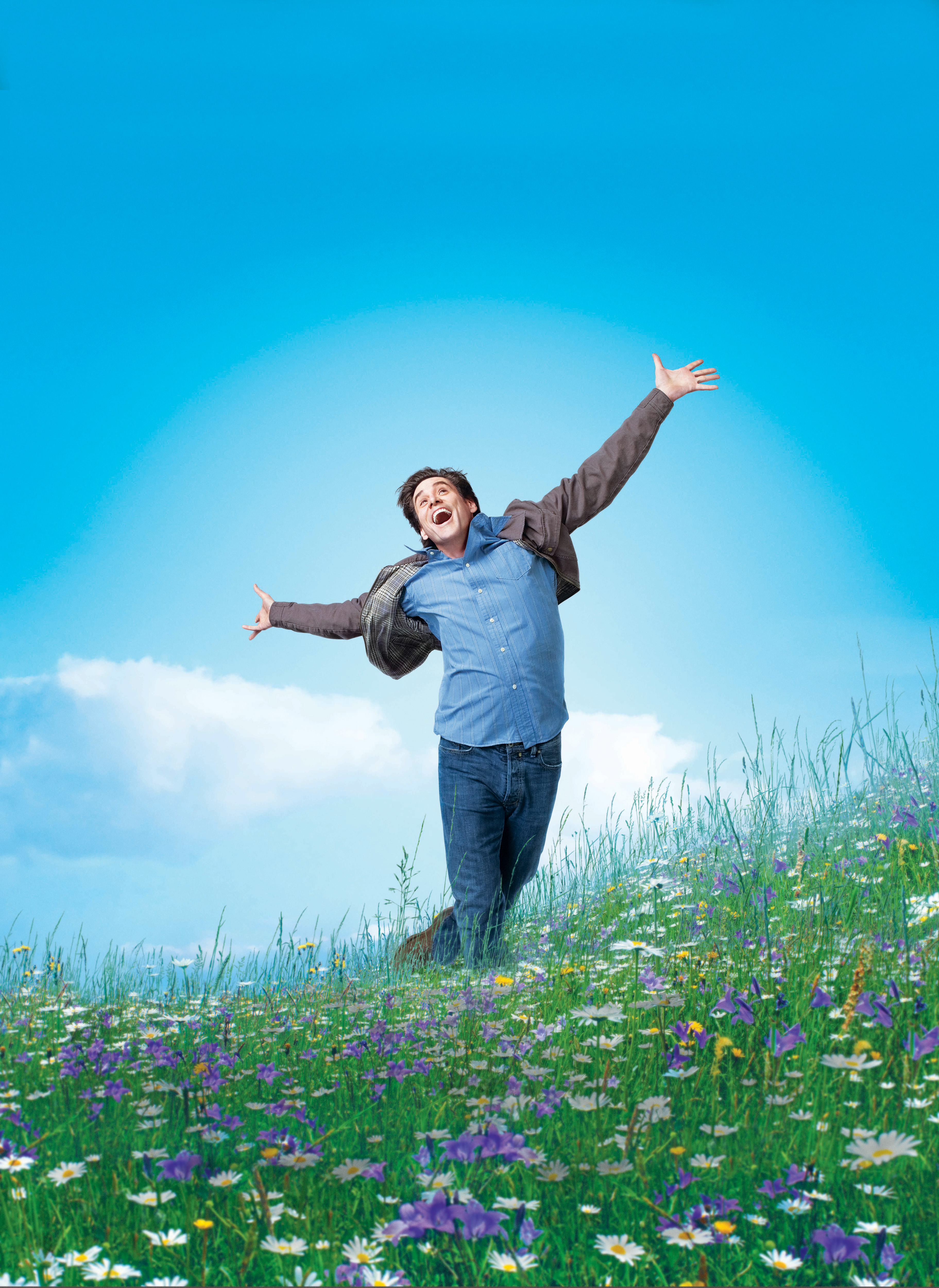Man jumping in a field of flowers HD Wallpaper