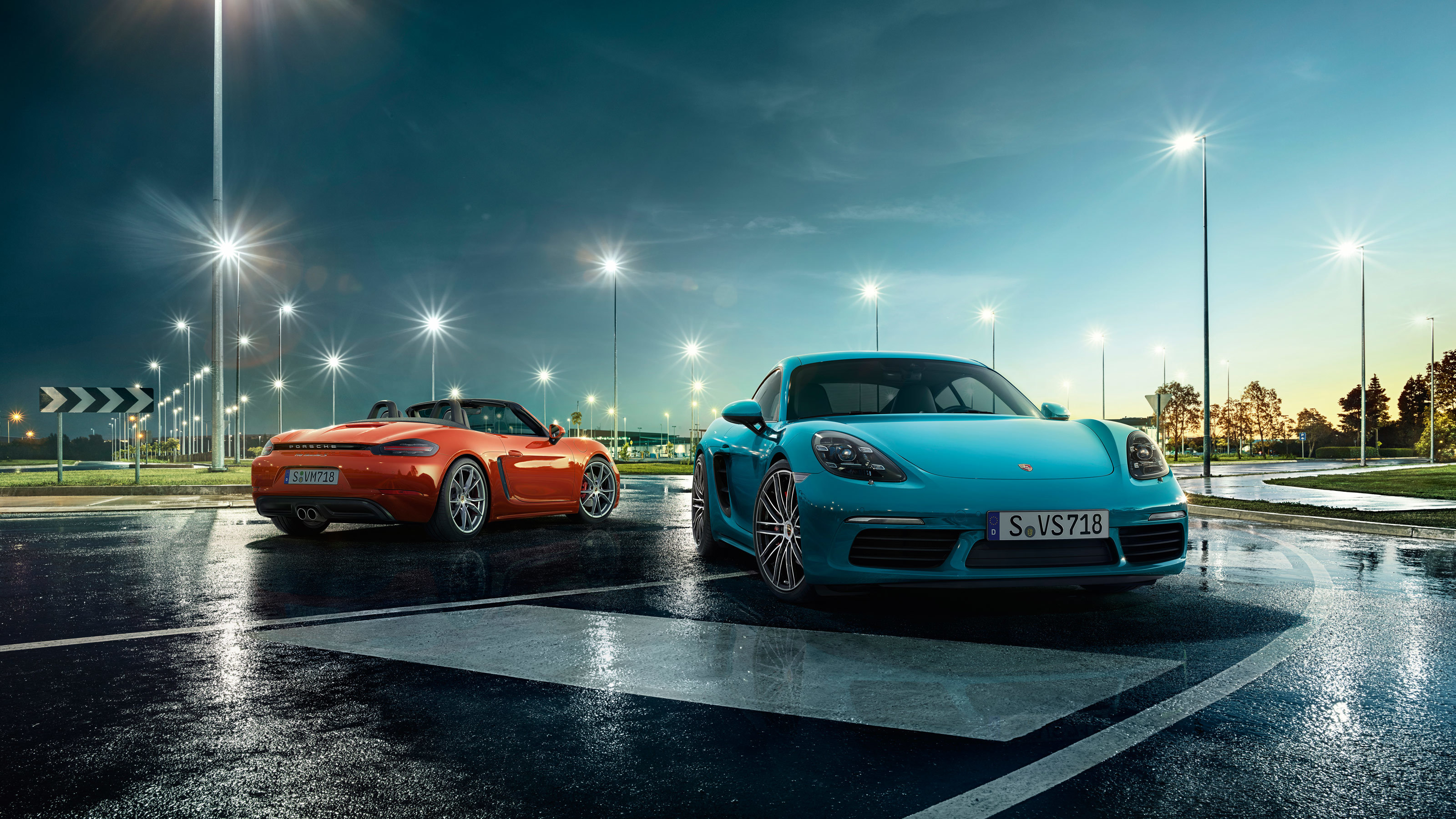 Porsche 718 Cayman S and 718 Boxster on wet road HD Wallpaper