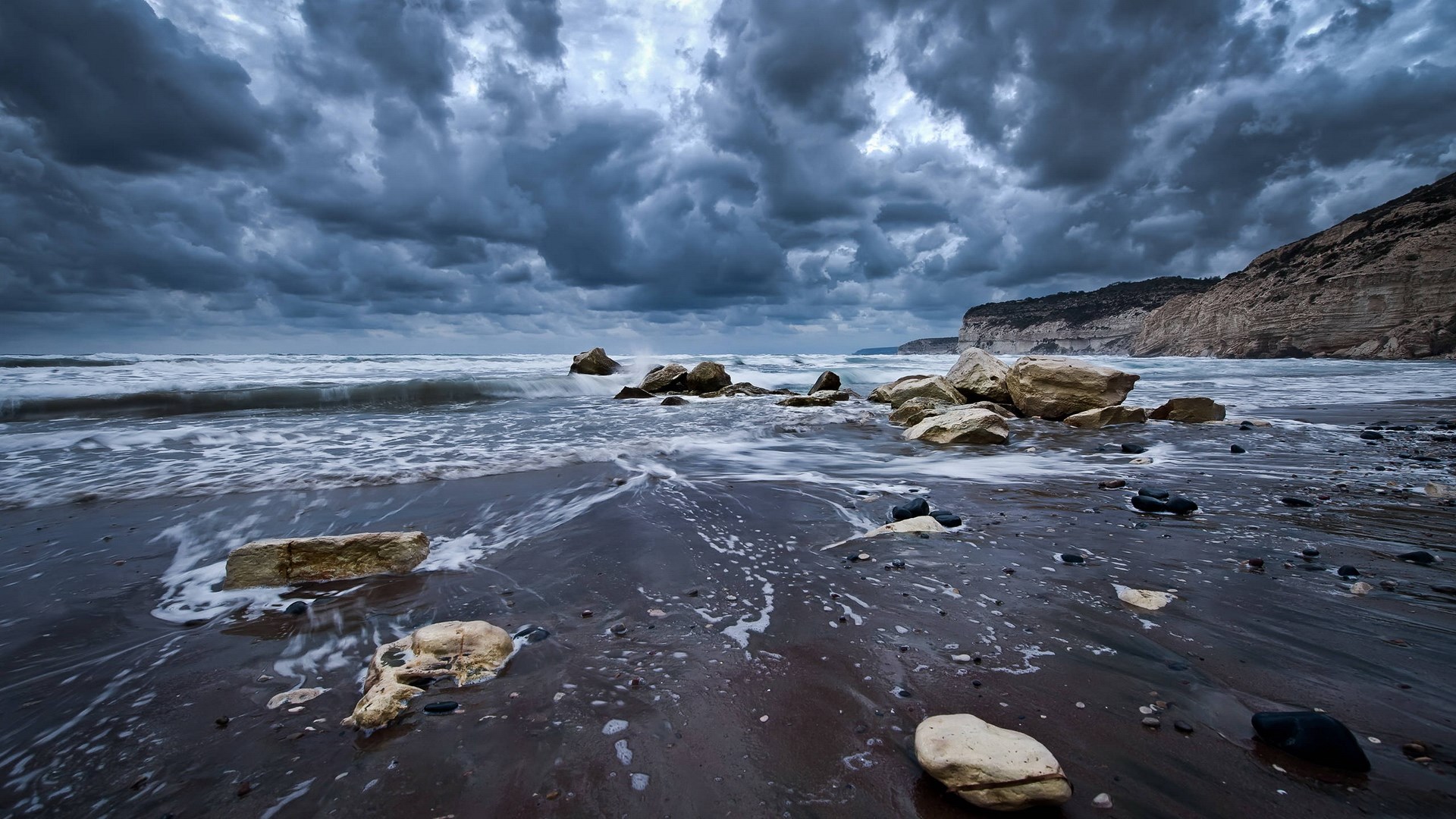 Stormy Beach with Waves and Rocks HD Wallpaper