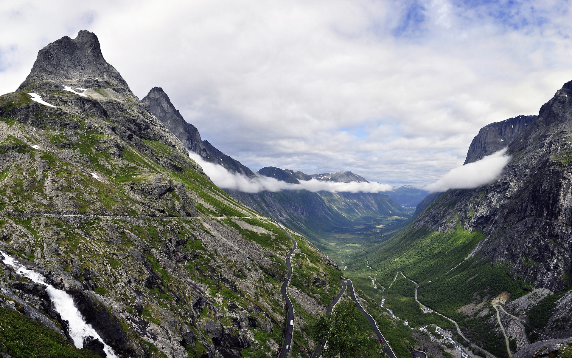 Winding mountain road through a valley in Norway HD Wallpaper