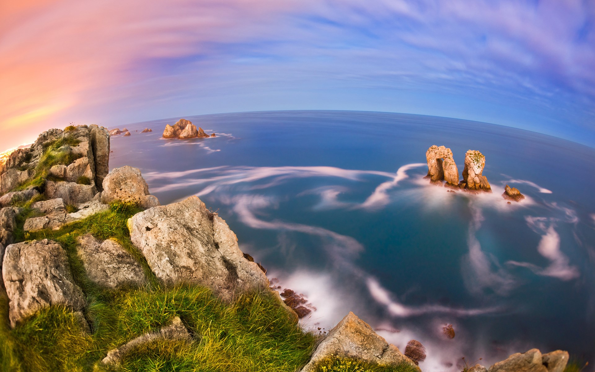 Rocky coast with sea stacks at sunset HD Wallpaper