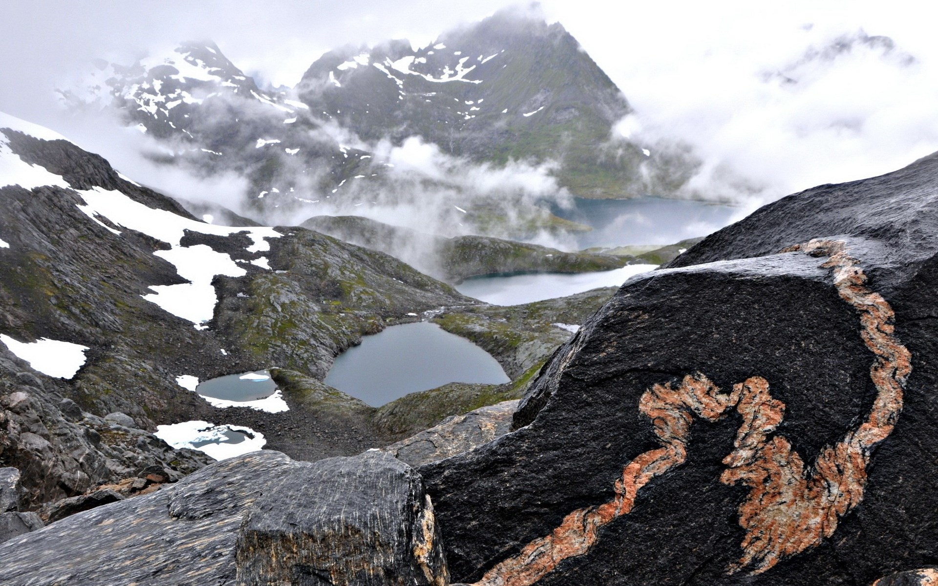 Rocky mountain landscape with lakes and fog HD Wallpaper