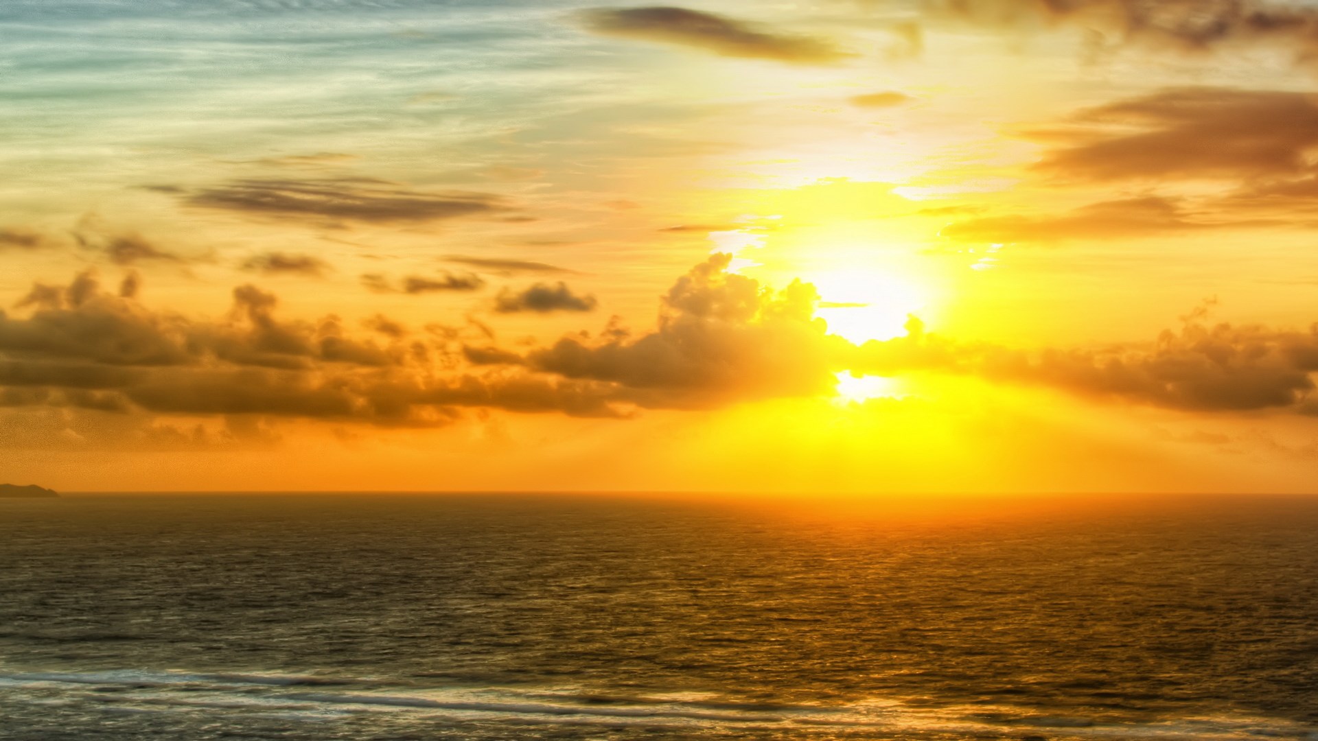 Sunset over the ocean with clouds HD Wallpaper