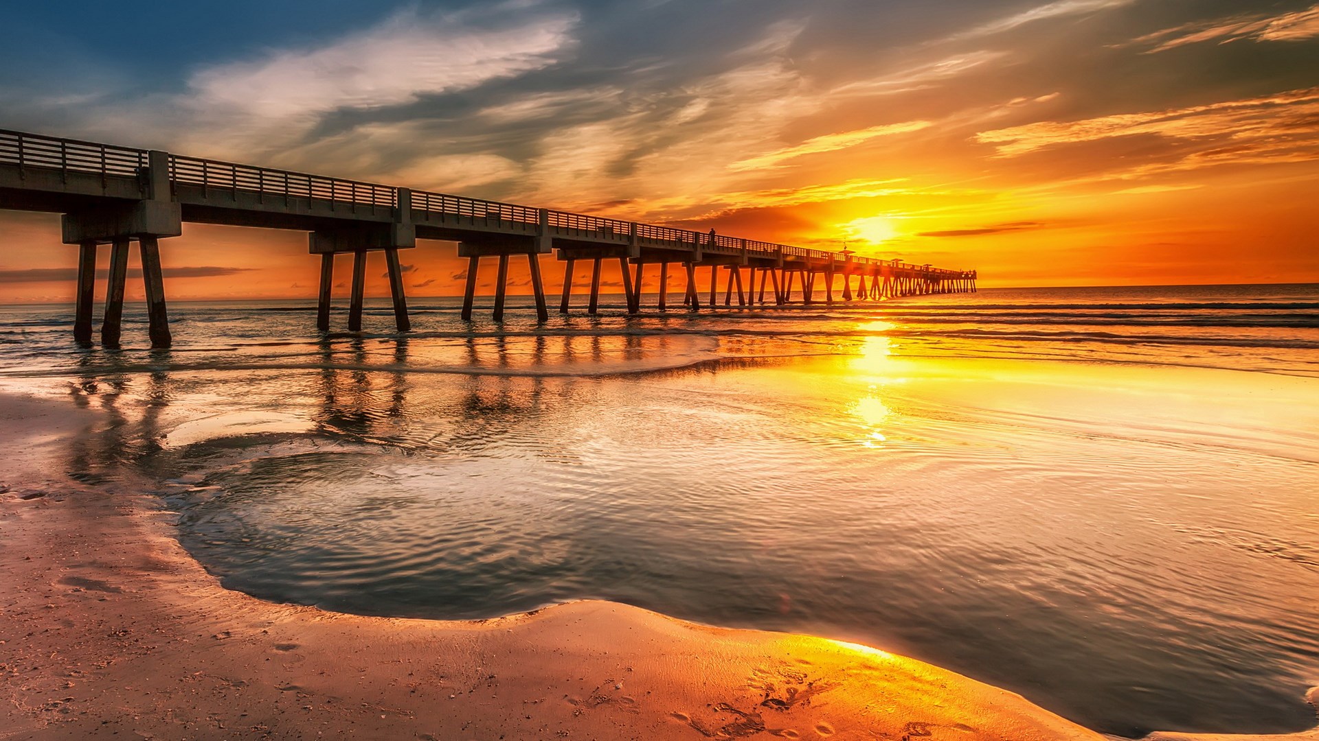 Pier over the ocean at sunset HD Wallpaper