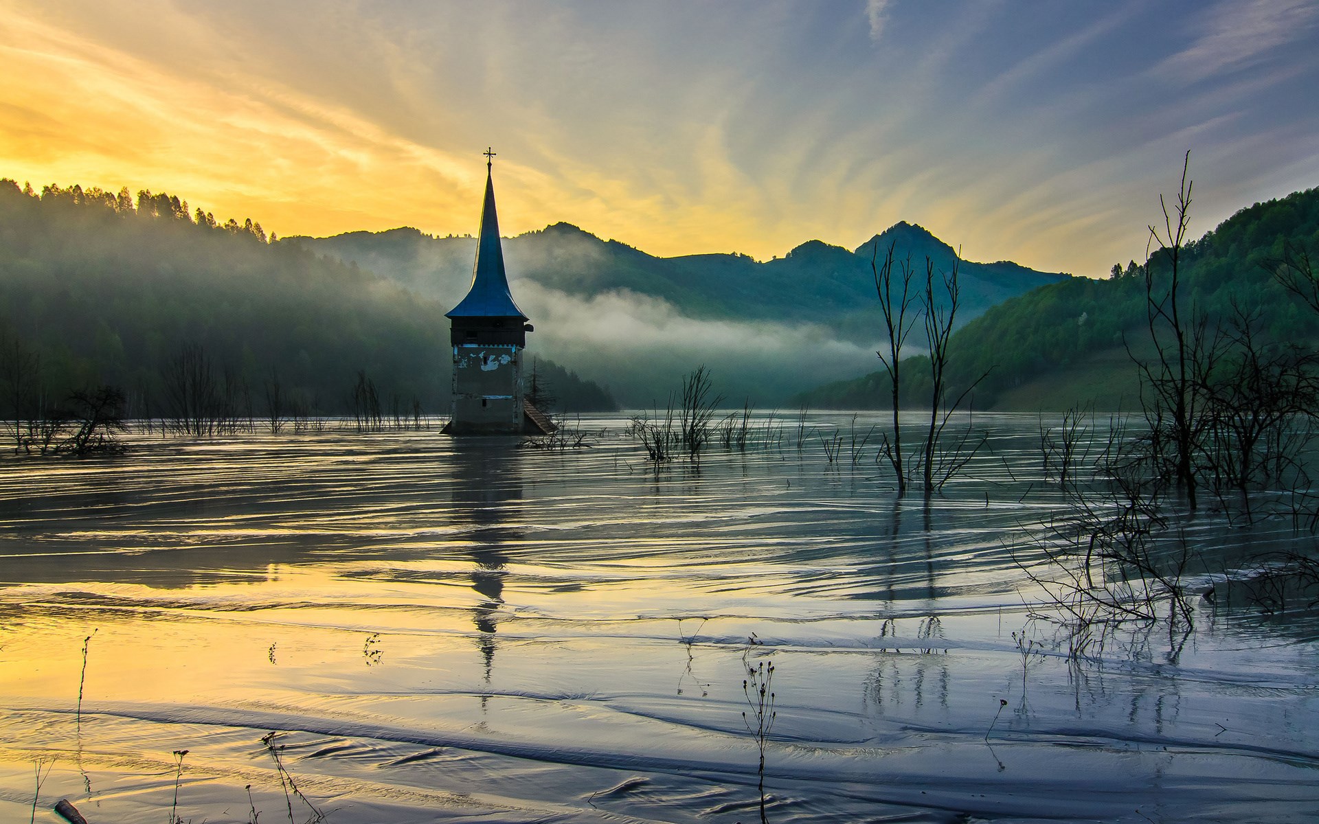 Flooded church tower in a lake at sunrise HD Wallpaper
