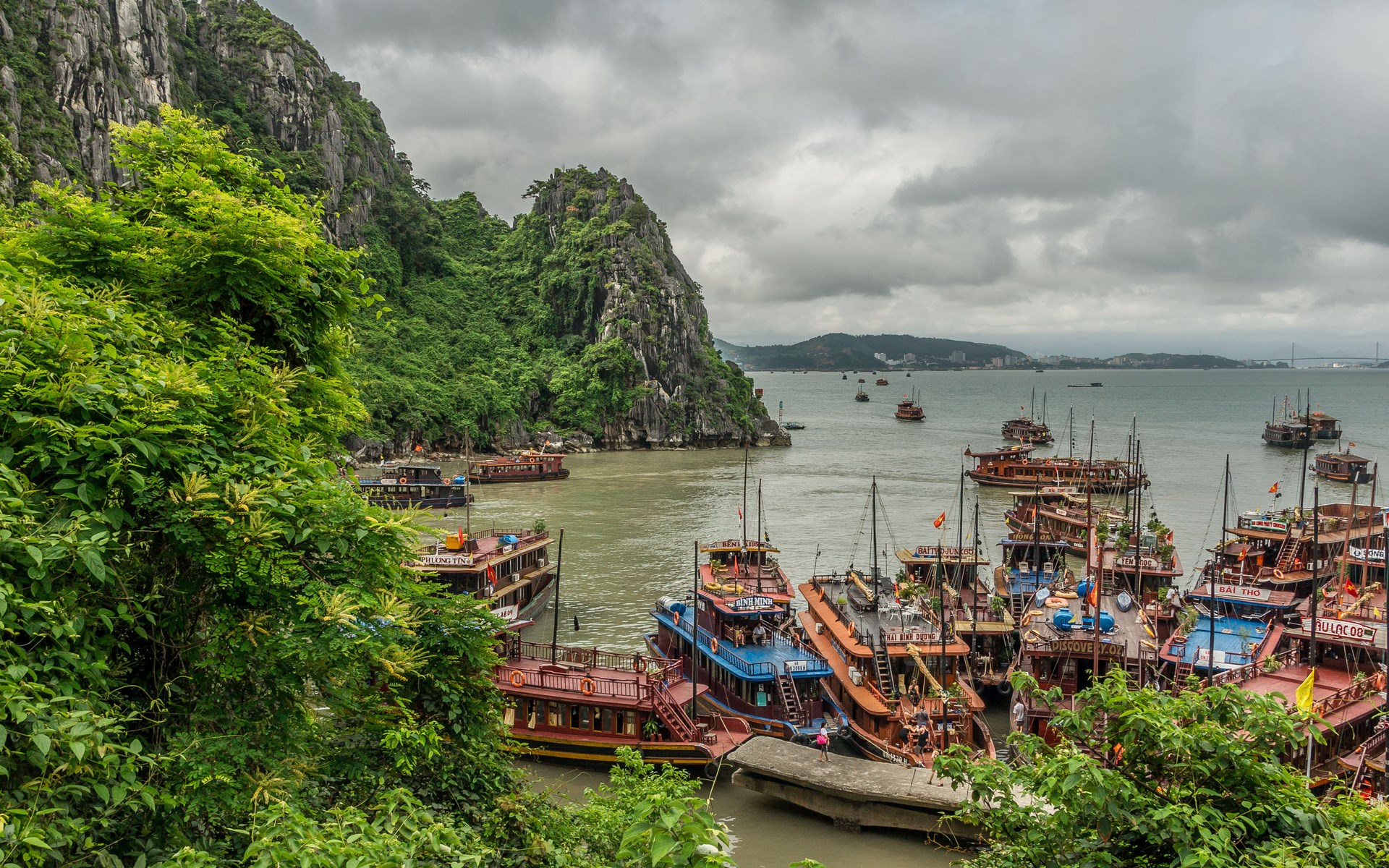 Boats docked in Ha Long Bay, Vietnam HD Wallpaper