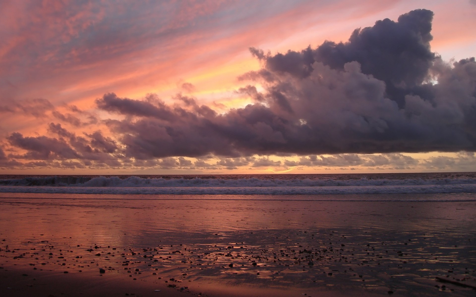 Sunset over the ocean with dramatic clouds HD Wallpaper