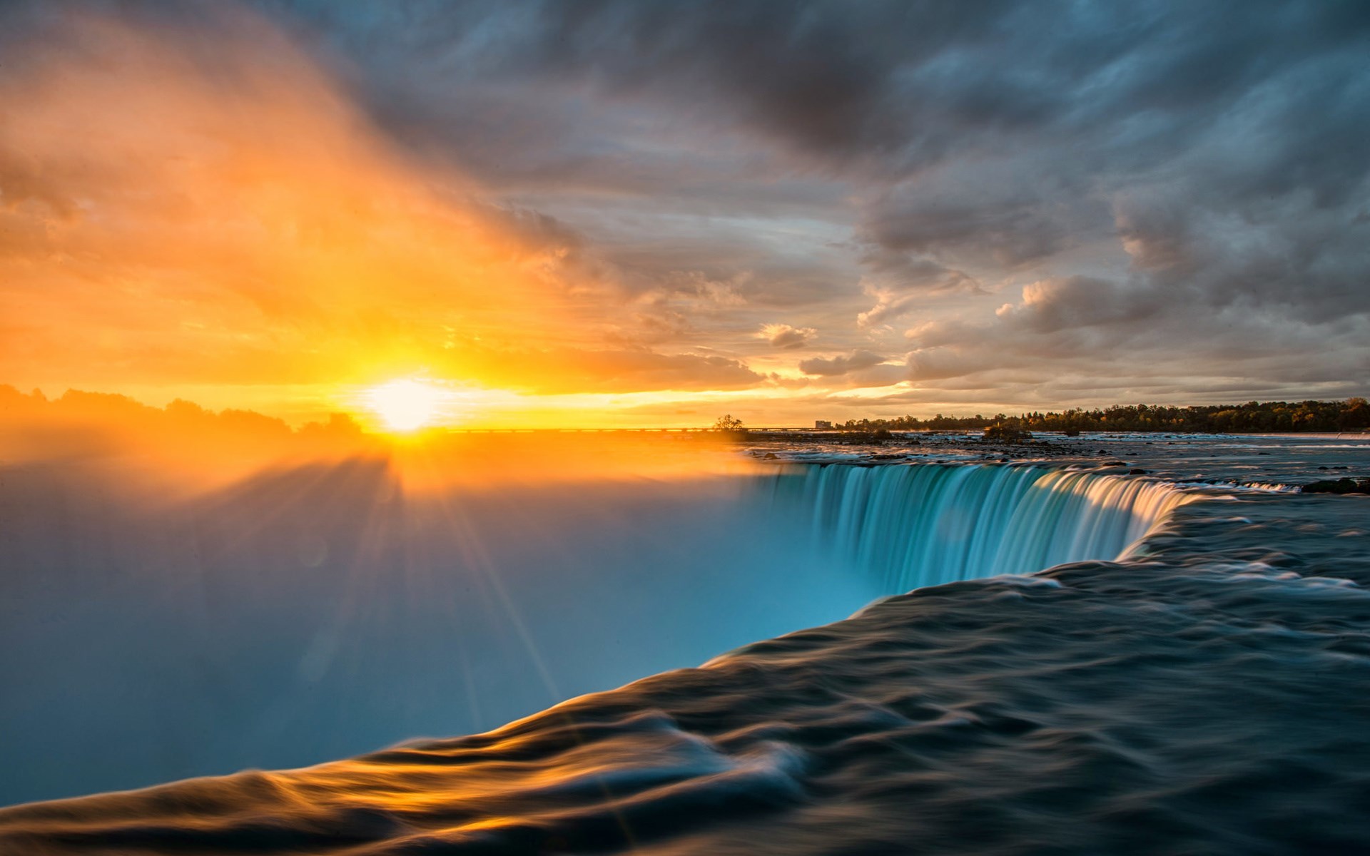 Niagara Falls at sunset with sun rays HD Wallpaper