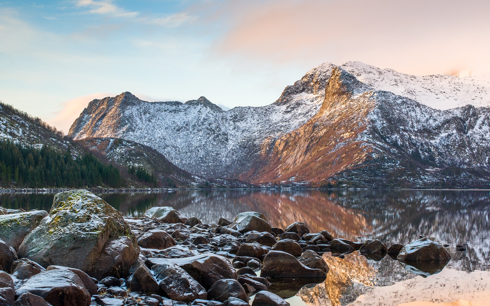 Snow-capped mountains reflected in a calm lake HD Wallpaper