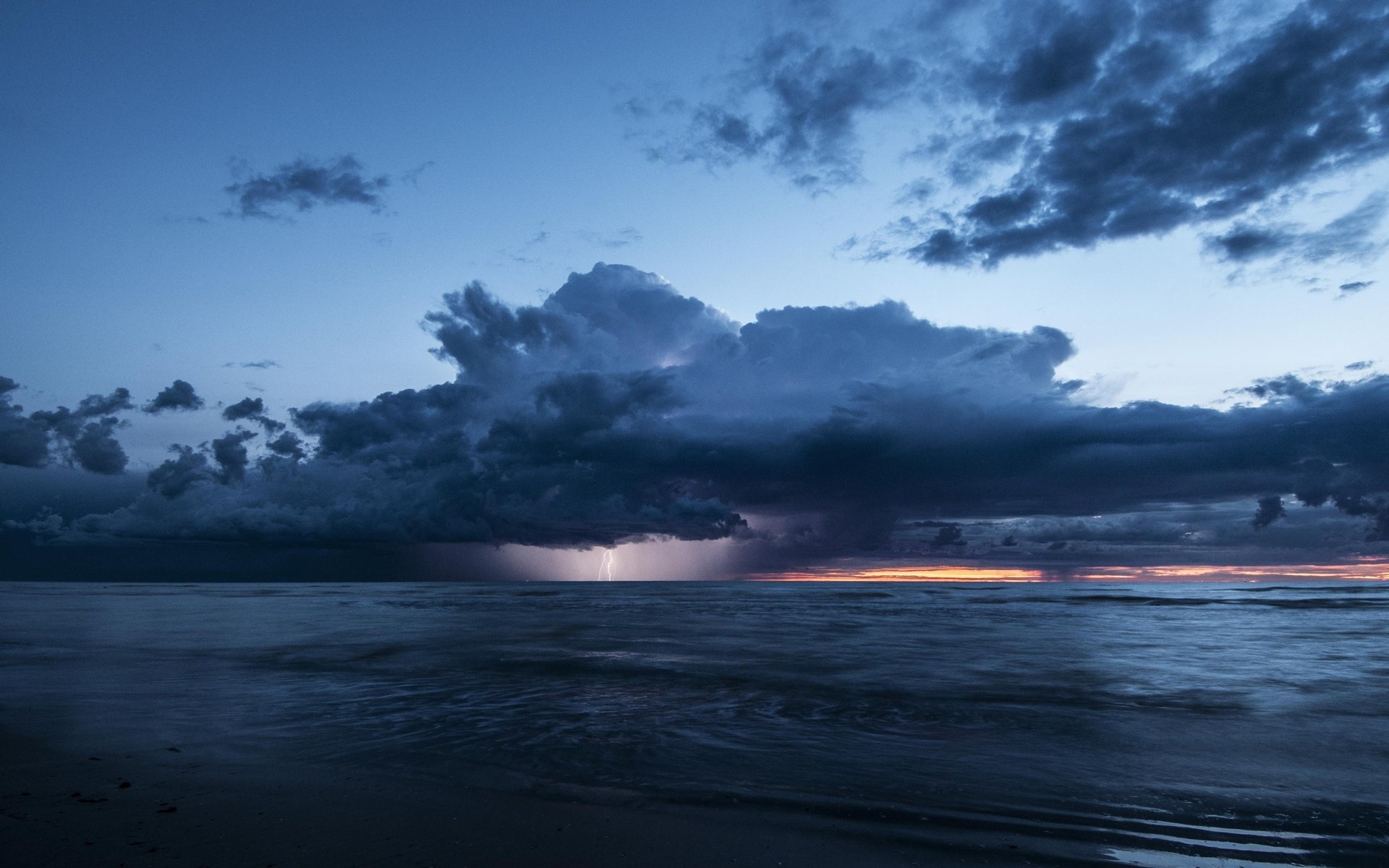 Lightning strike over the ocean during a storm HD Wallpaper