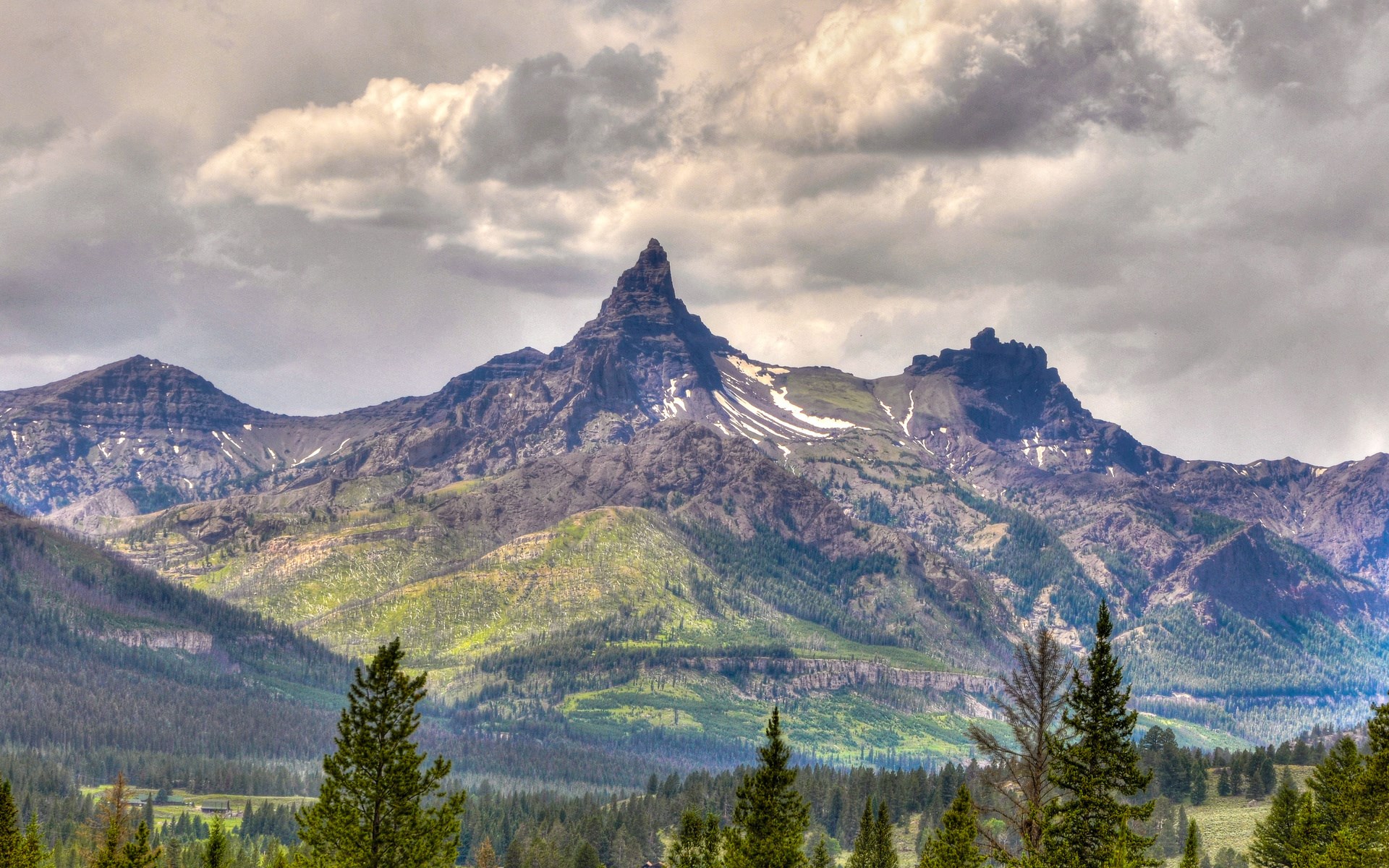 Jagged mountain peak under cloudy sky HD Wallpaper