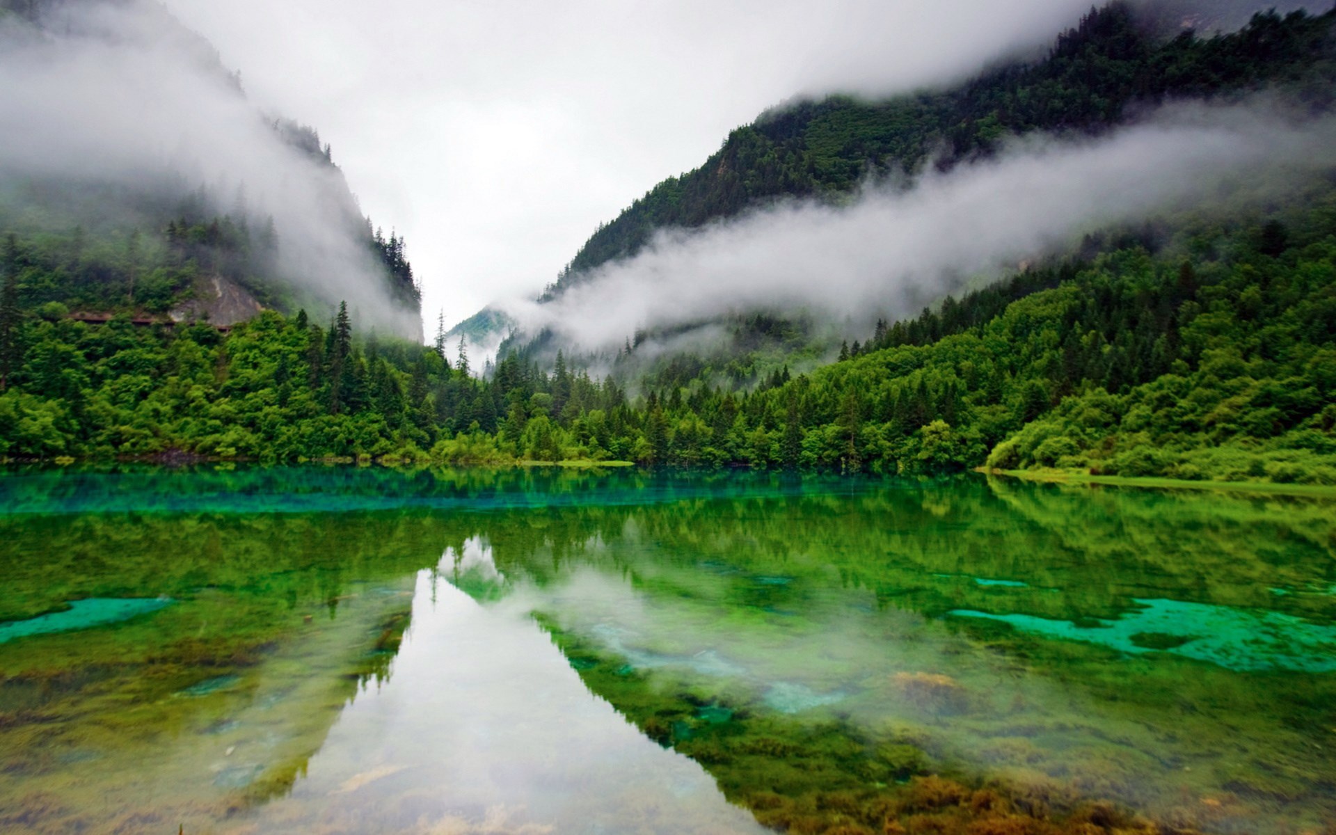 Misty Mountains Reflecting in a Turquoise Lake HD Wallpaper