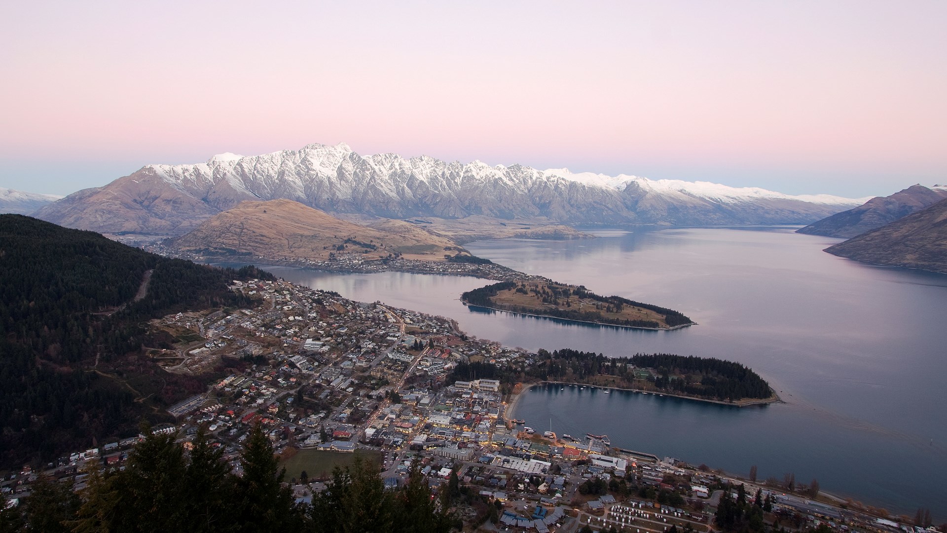 Queenstown New Zealand with snow-capped mountains and lake HD Wallpaper