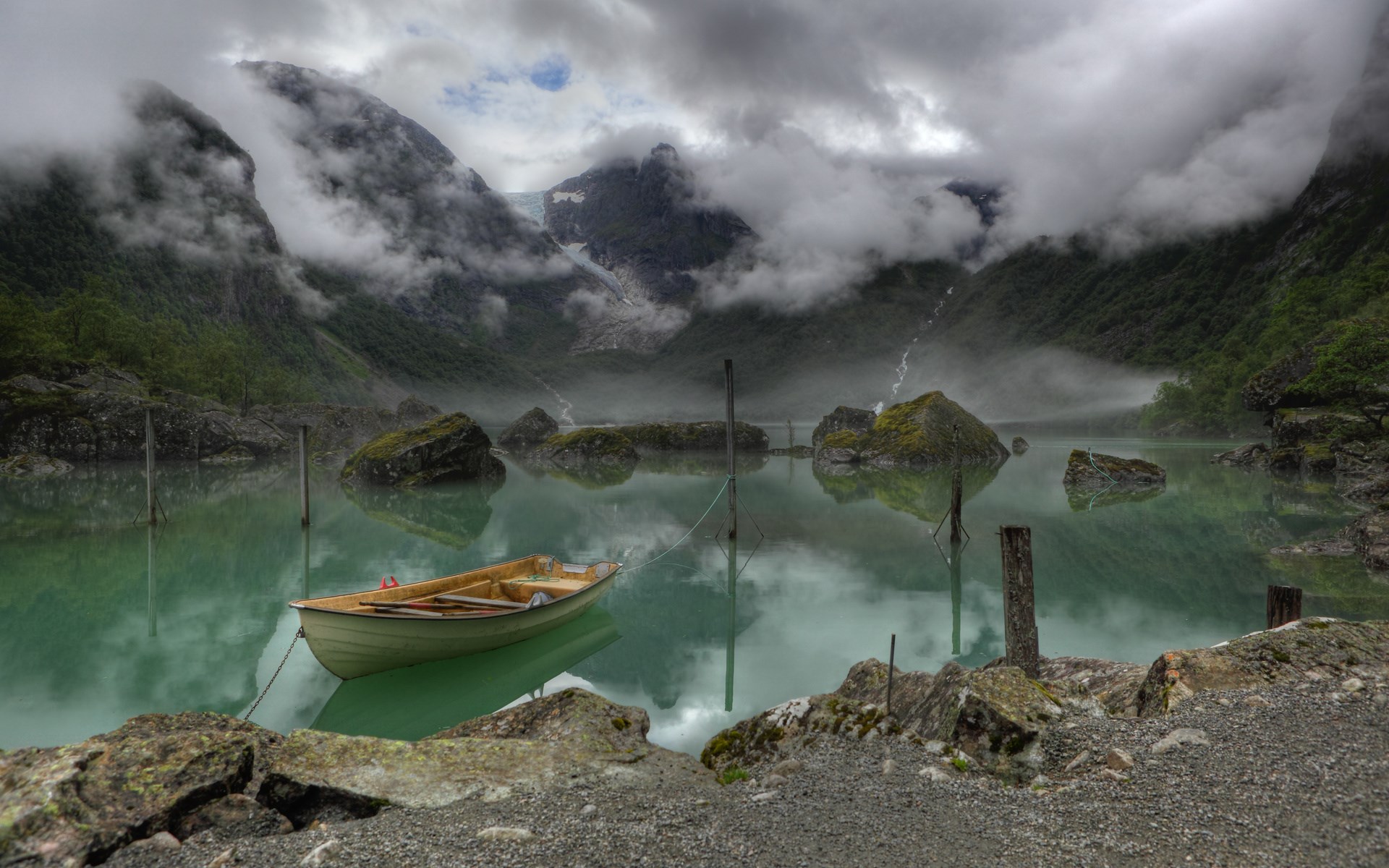 Boat on a misty lake with mountains HD Wallpaper