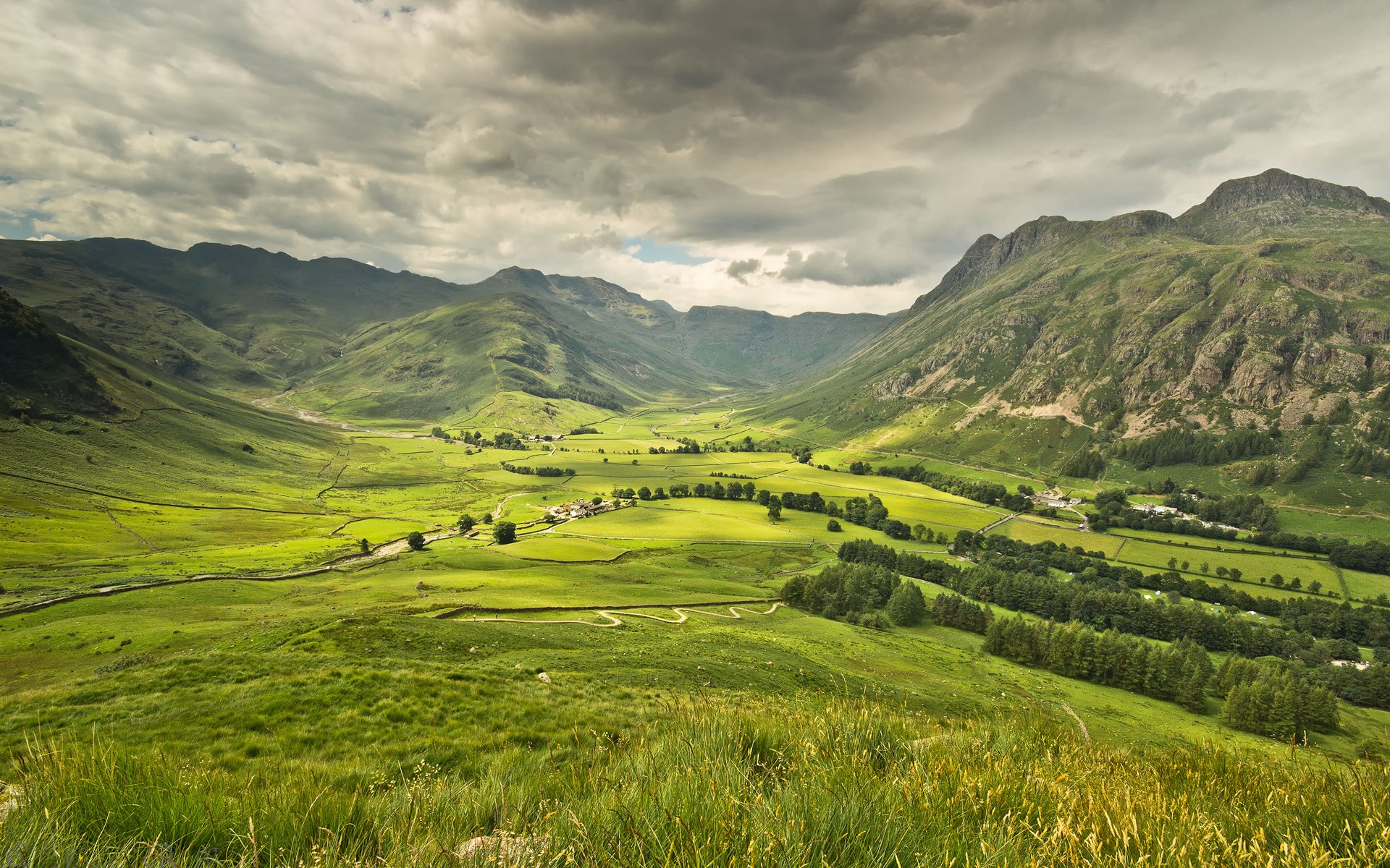 Green Valley with Mountains and Winding Path HD Wallpaper
