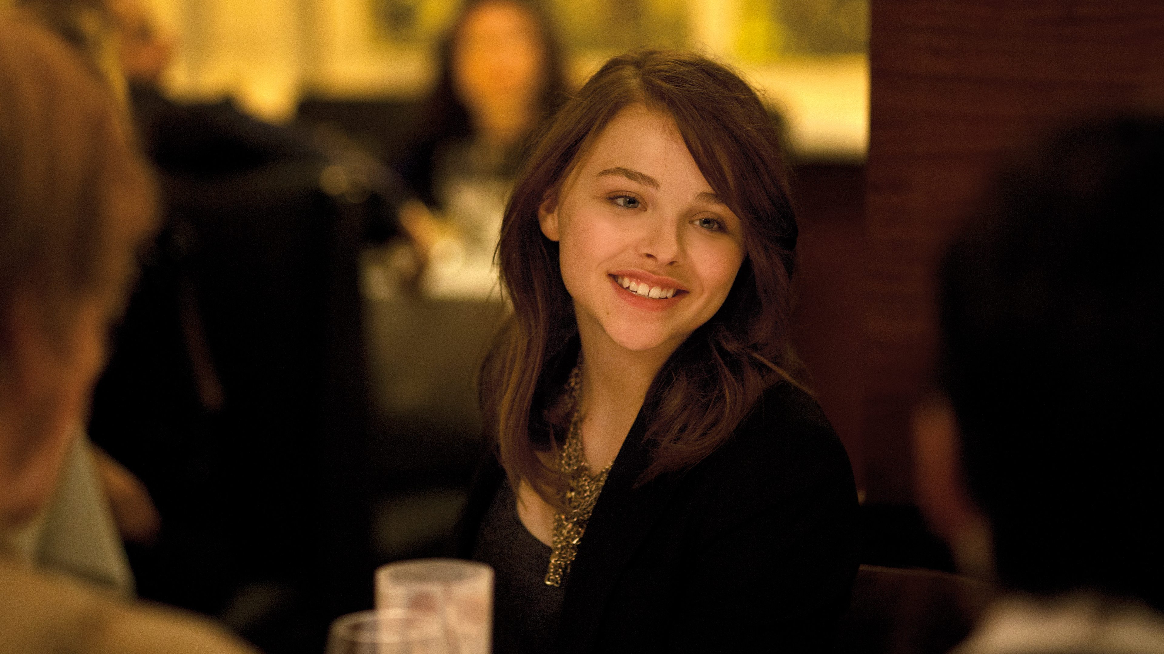 Chloe Grace Moretz at a Dinner Table HD Wallpaper