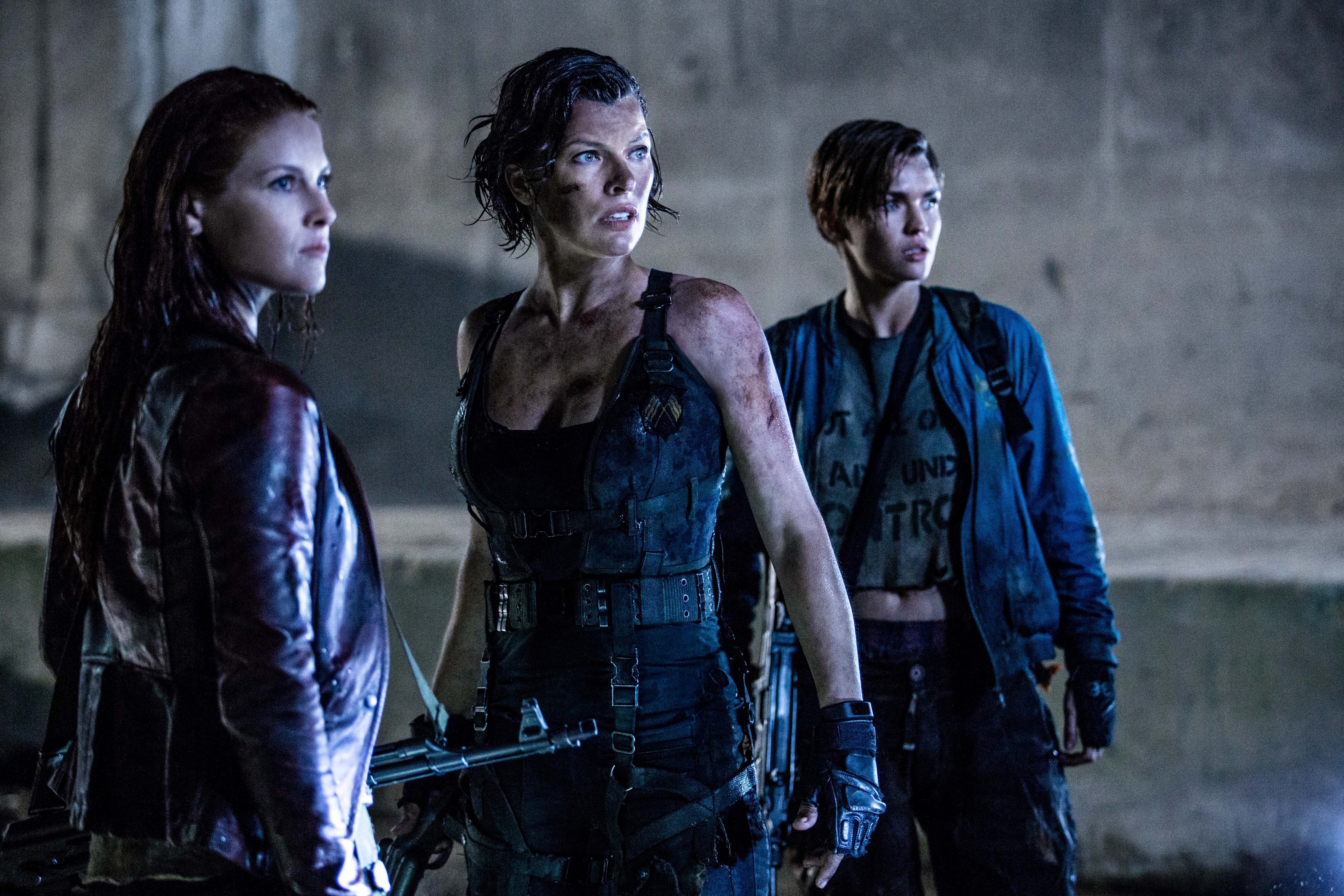 Milla Jovovich and companions in Resident Evil HD Wallpaper