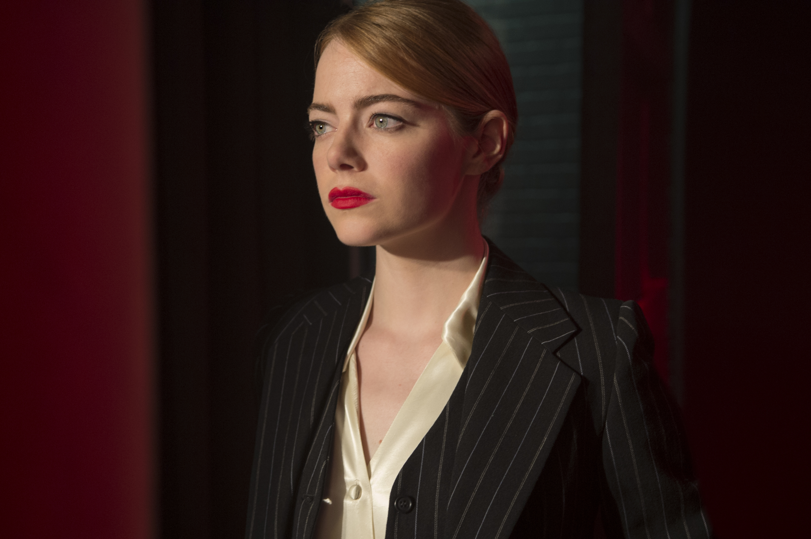 Emma Stone in a pinstripe suit HD Wallpaper