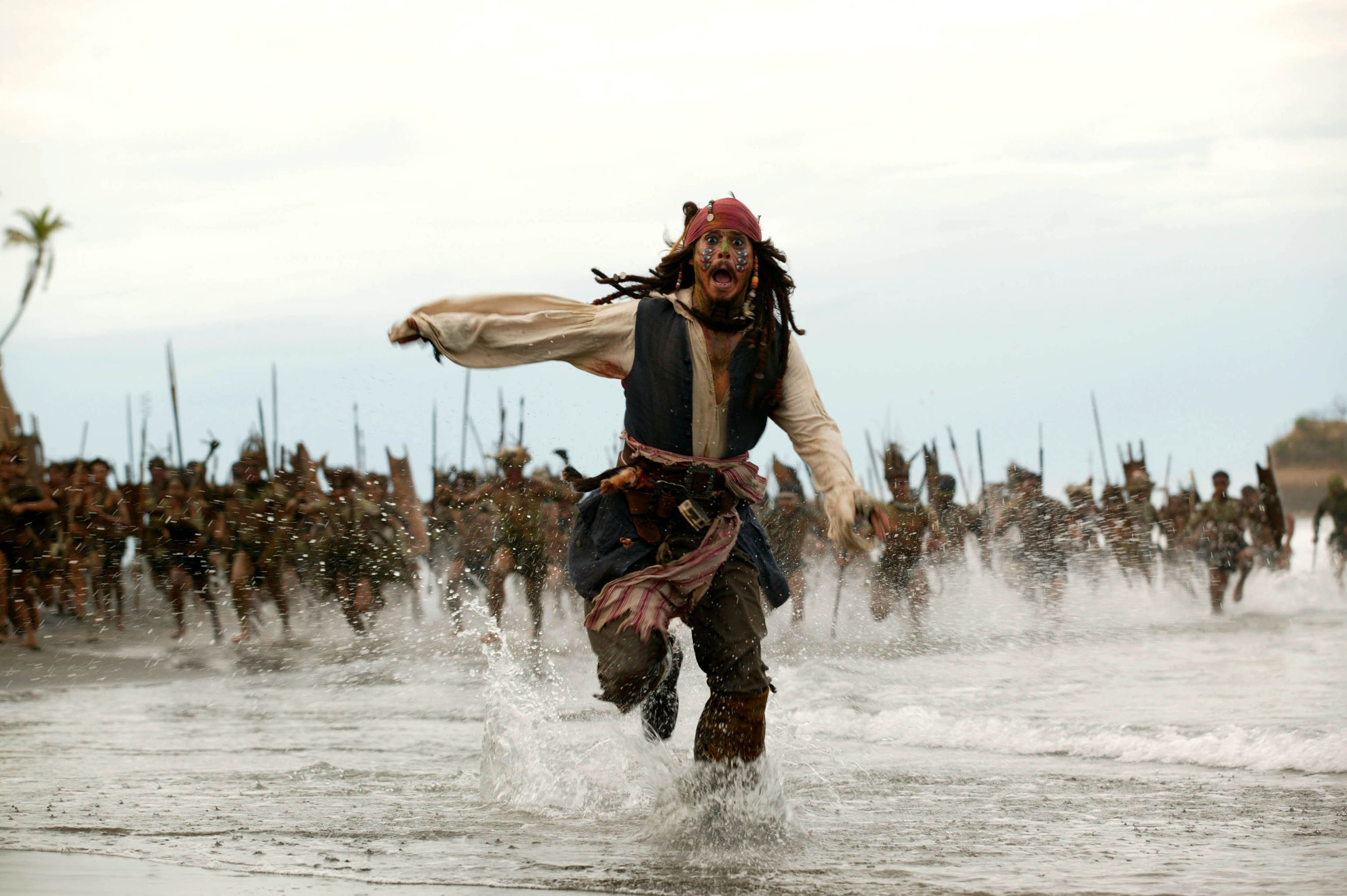 Johnny Depp as Captain Jack Sparrow running from cannibals HD Wallpaper
