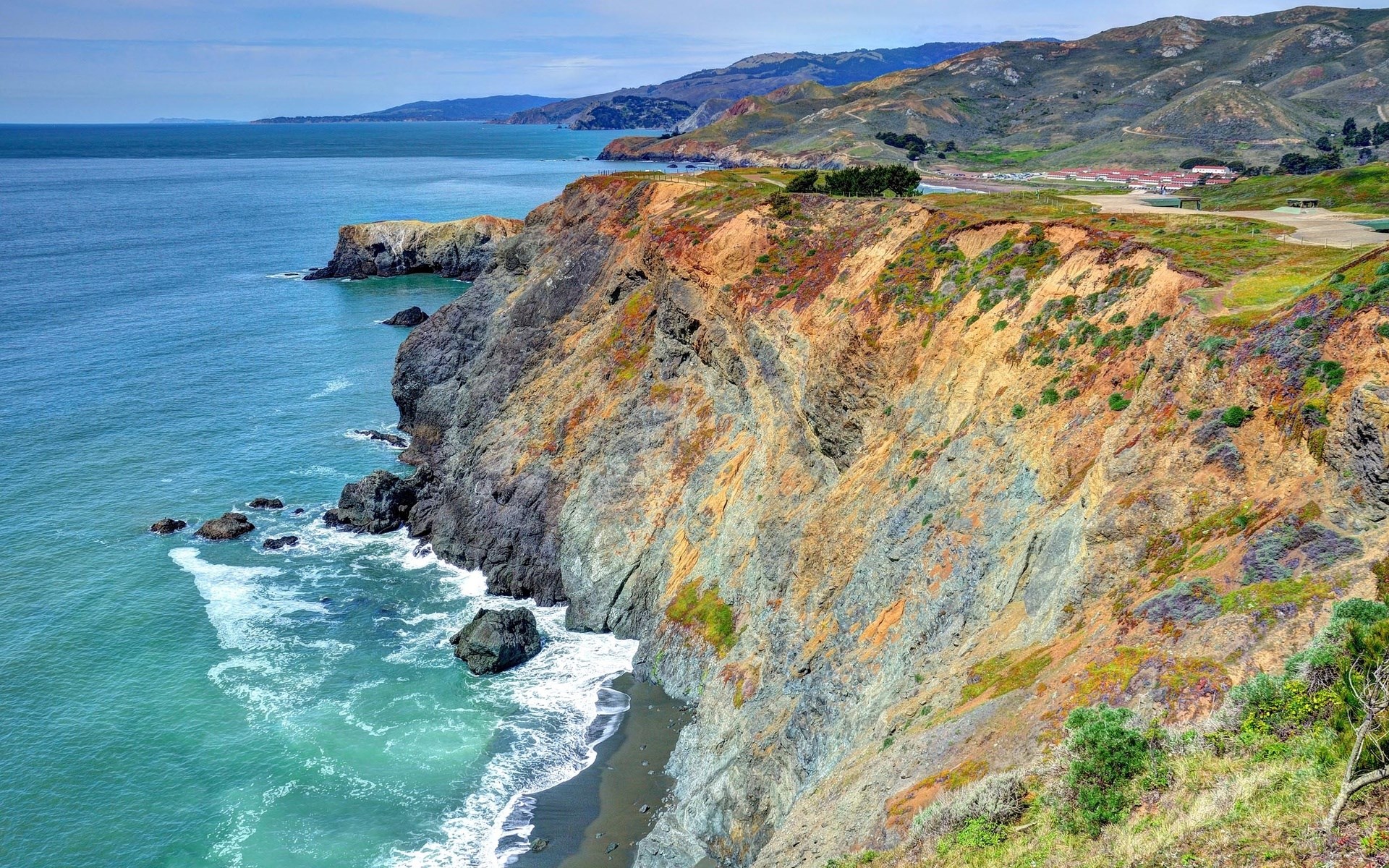 Coastal cliffs overlooking the ocean HD Wallpaper