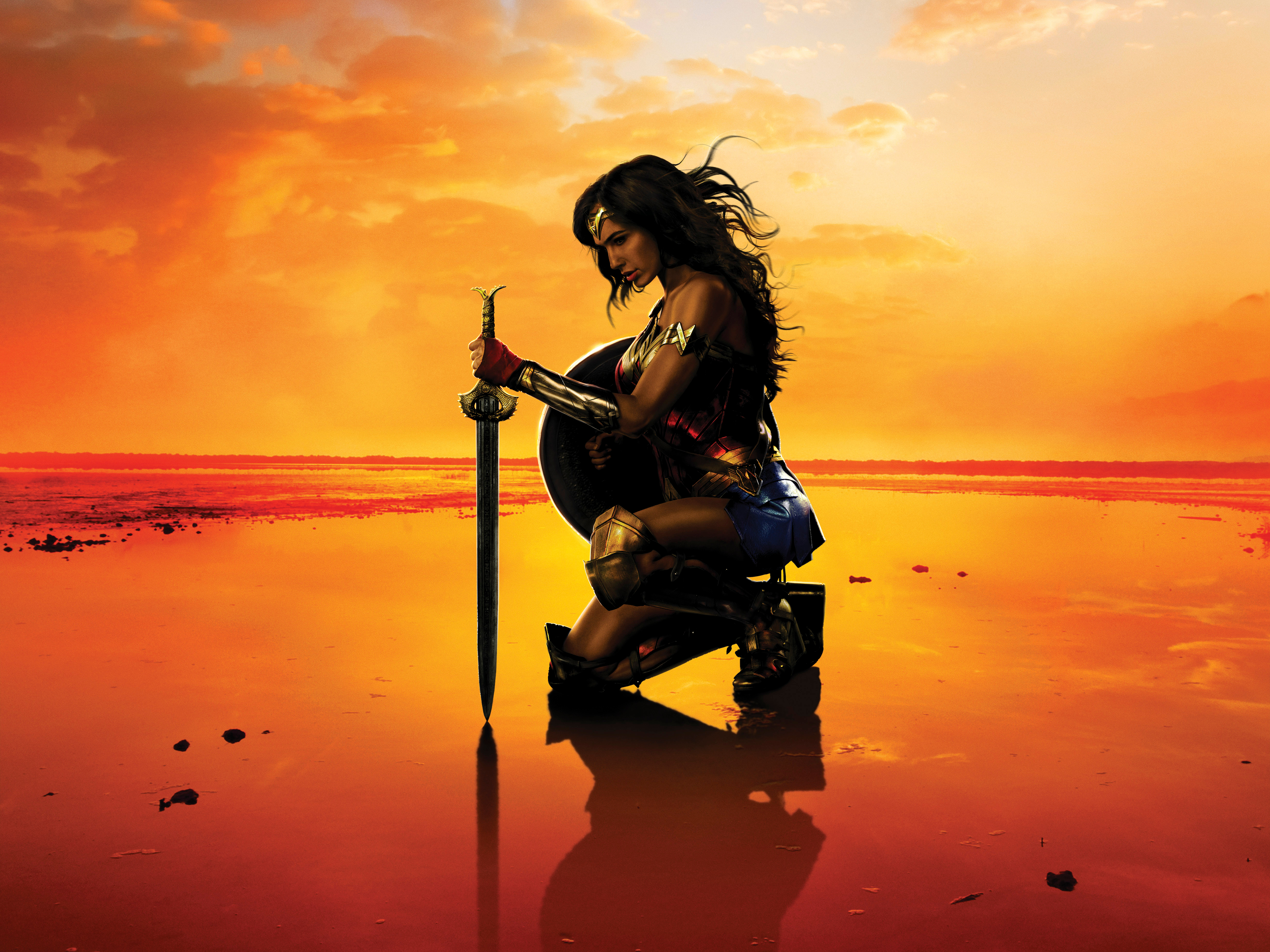 Wonder Woman kneeling with sword and shield HD Wallpaper