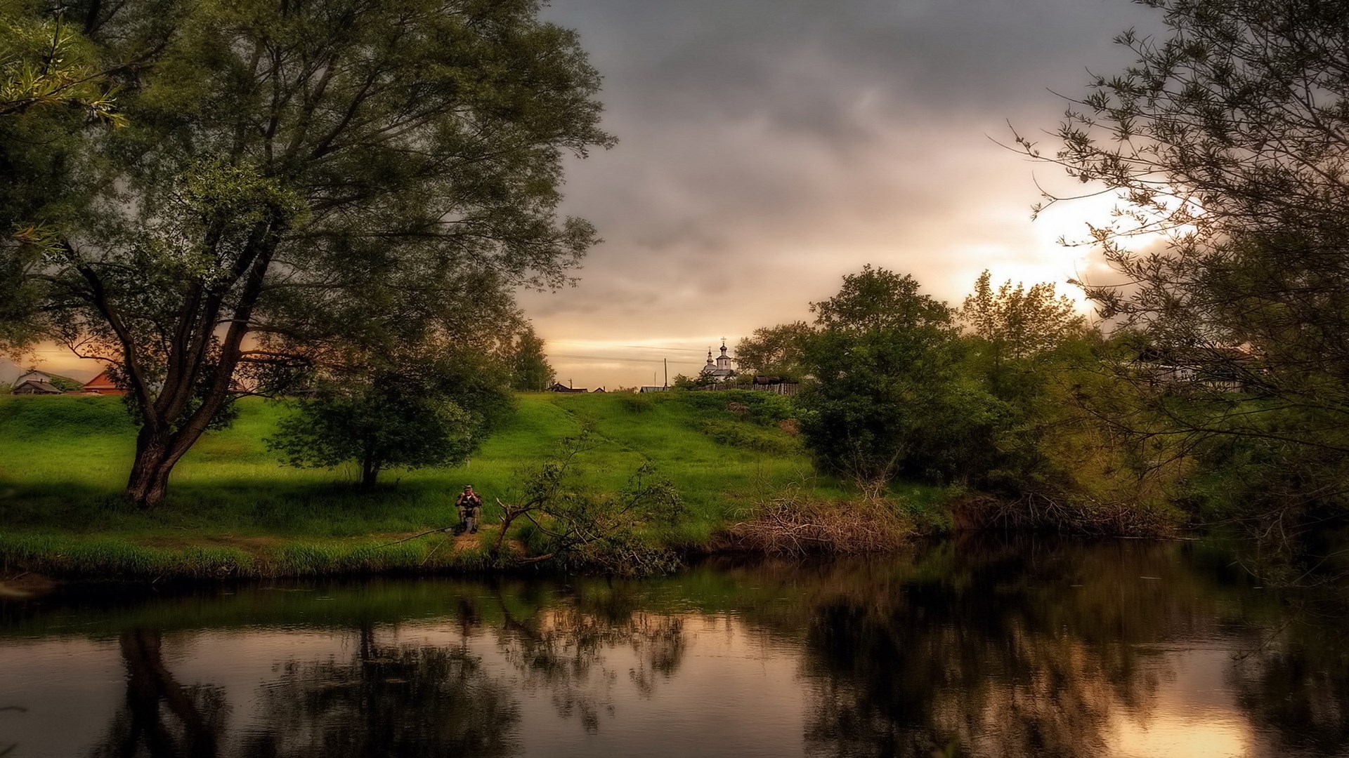 Fisherman by the river at sunset HD Wallpaper