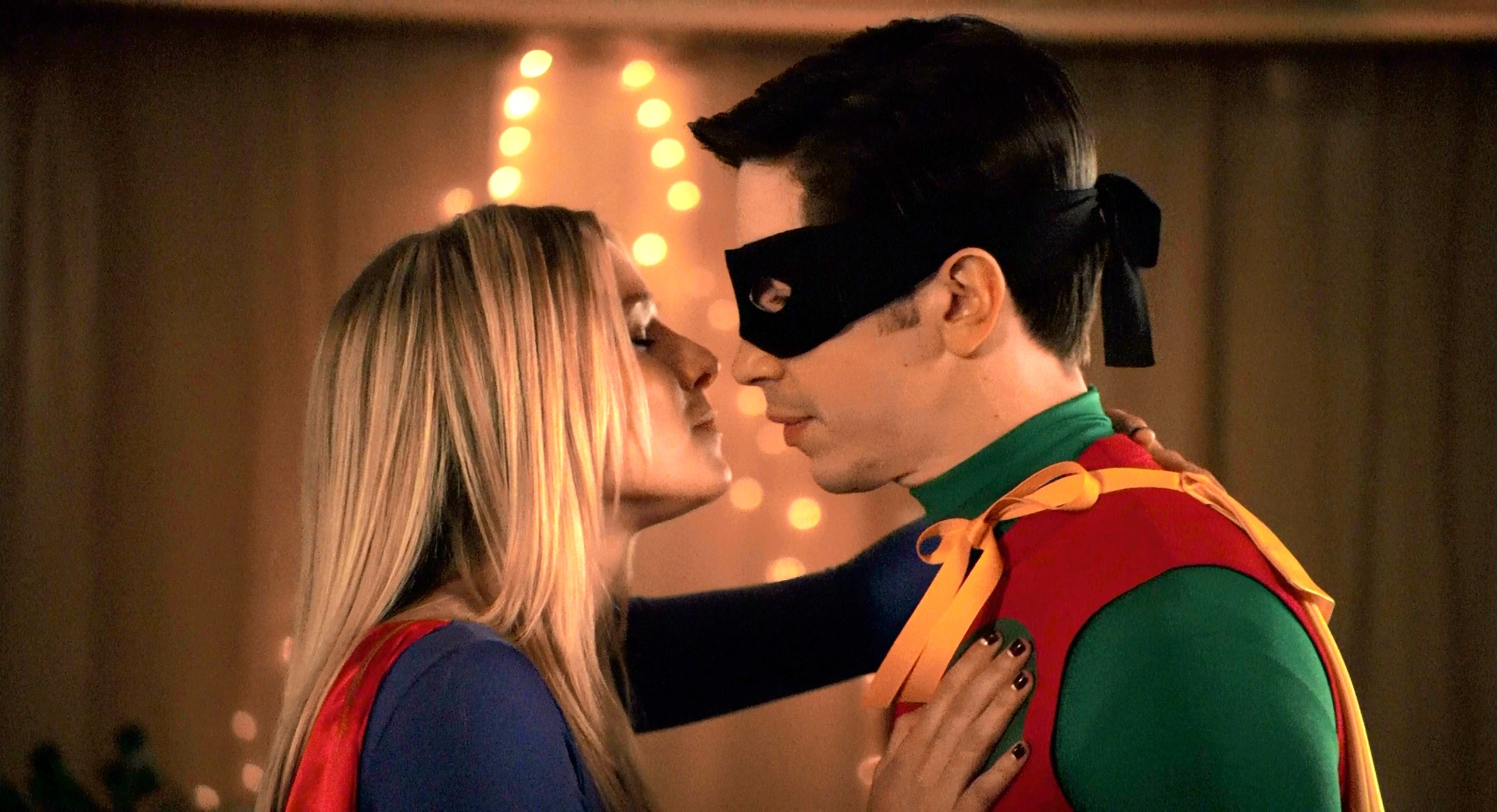 Kristen Bell as Supergirl and a man as Robin HD Wallpaper