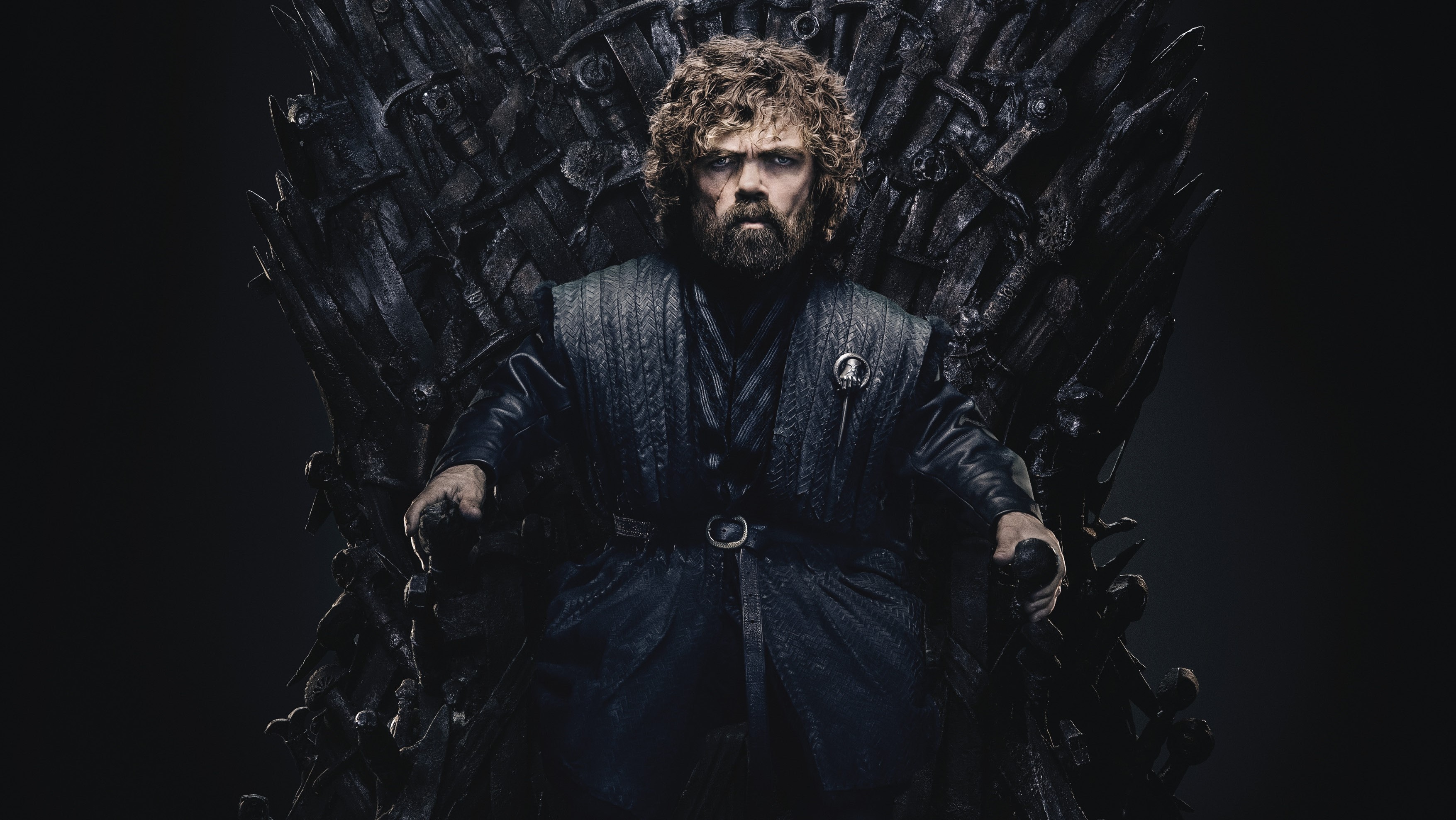 Tyrion Lannister from Game of Thrones sitting on the Iron Throne HD Wallpaper