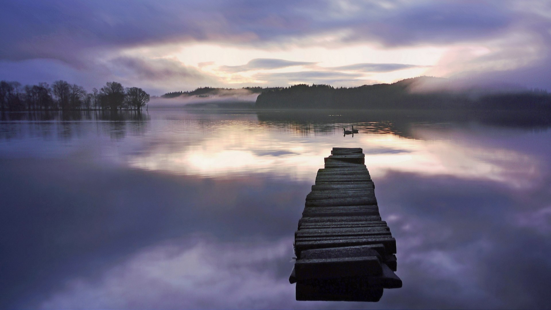 Wooden pier on a misty lake at dawn HD Wallpaper