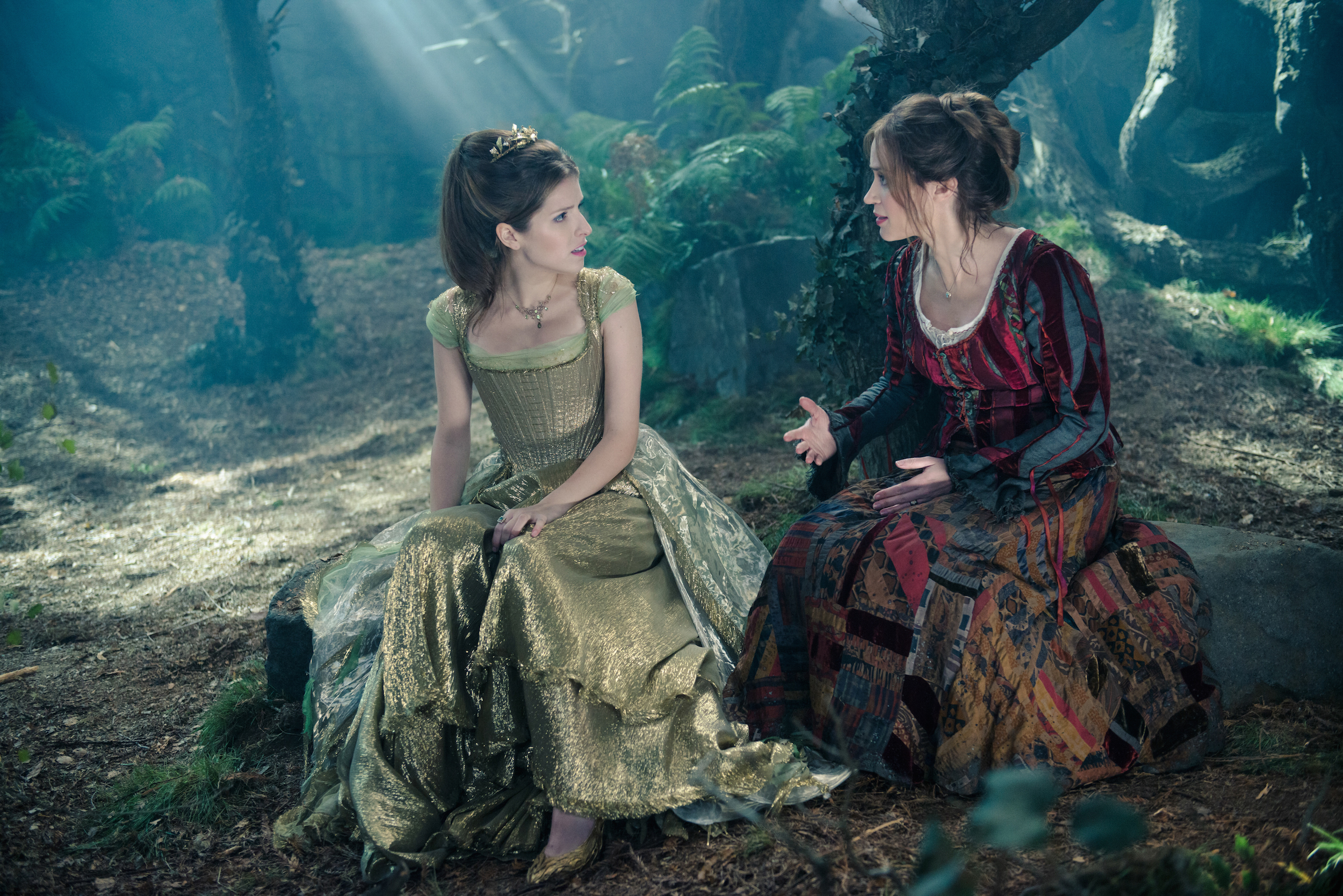 Anna Kendrick and Emily Blunt in a forest HD Wallpaper