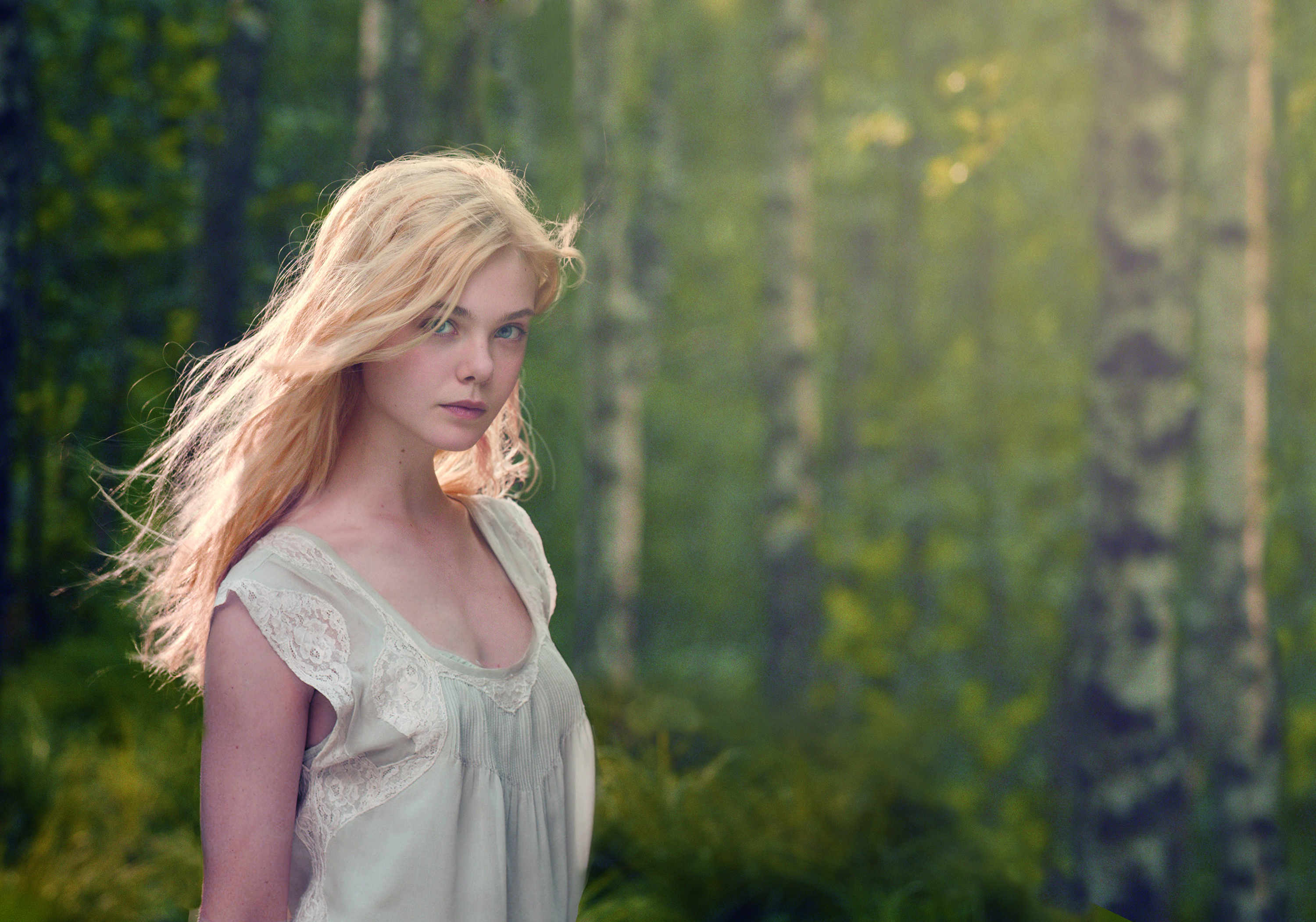 Elle Fanning in a forest HD Wallpaper