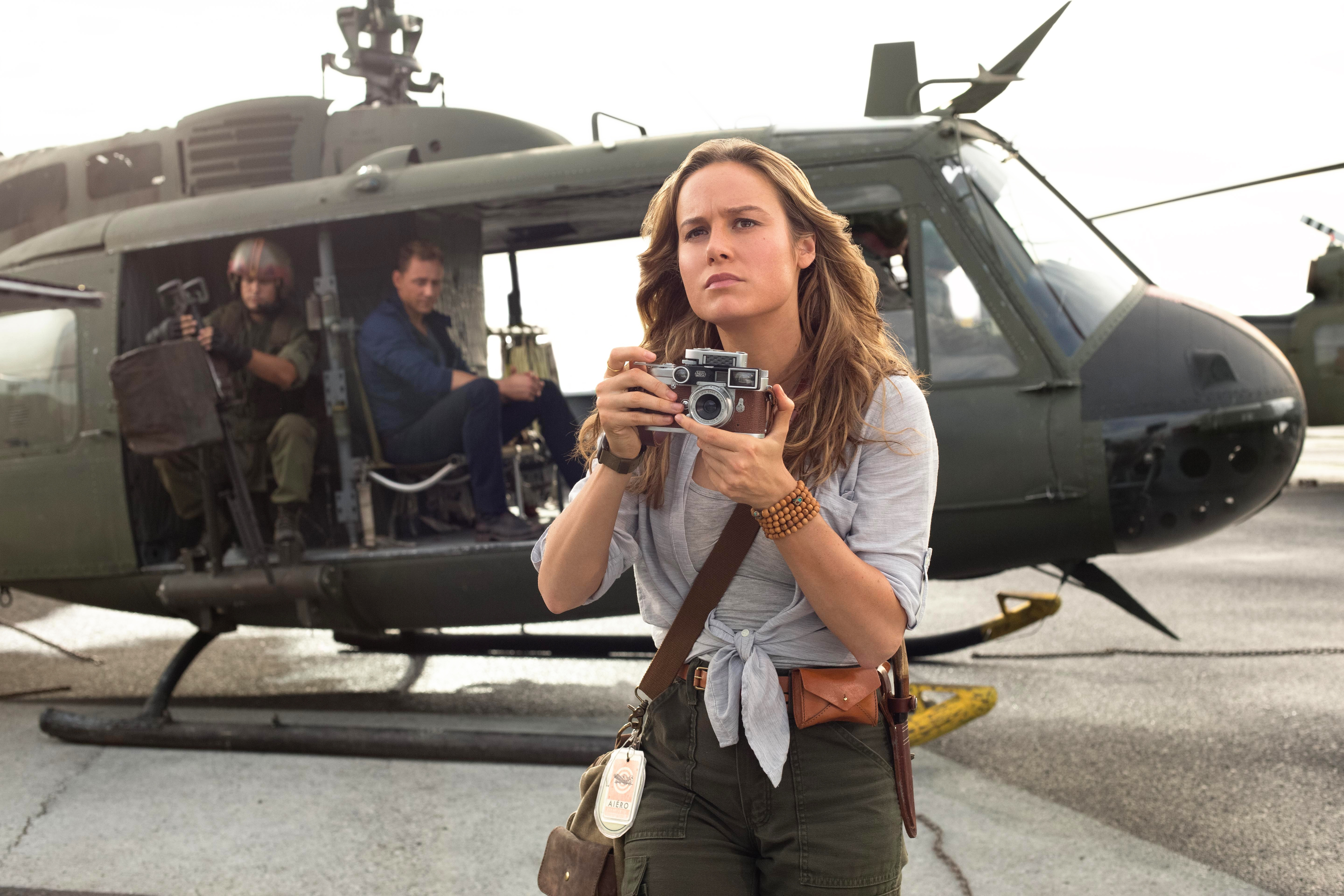 Brie Larson with camera and helicopter HD Wallpaper