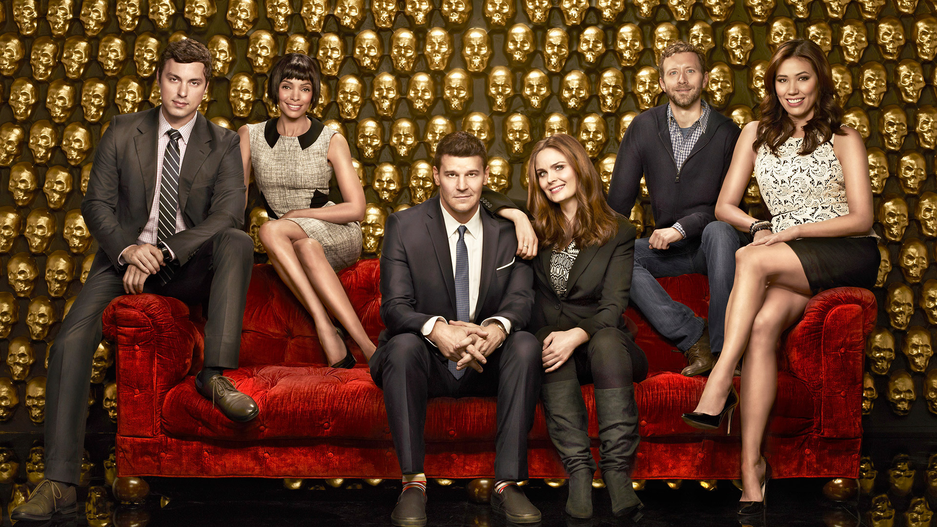 Bones cast on red couch HD Wallpaper