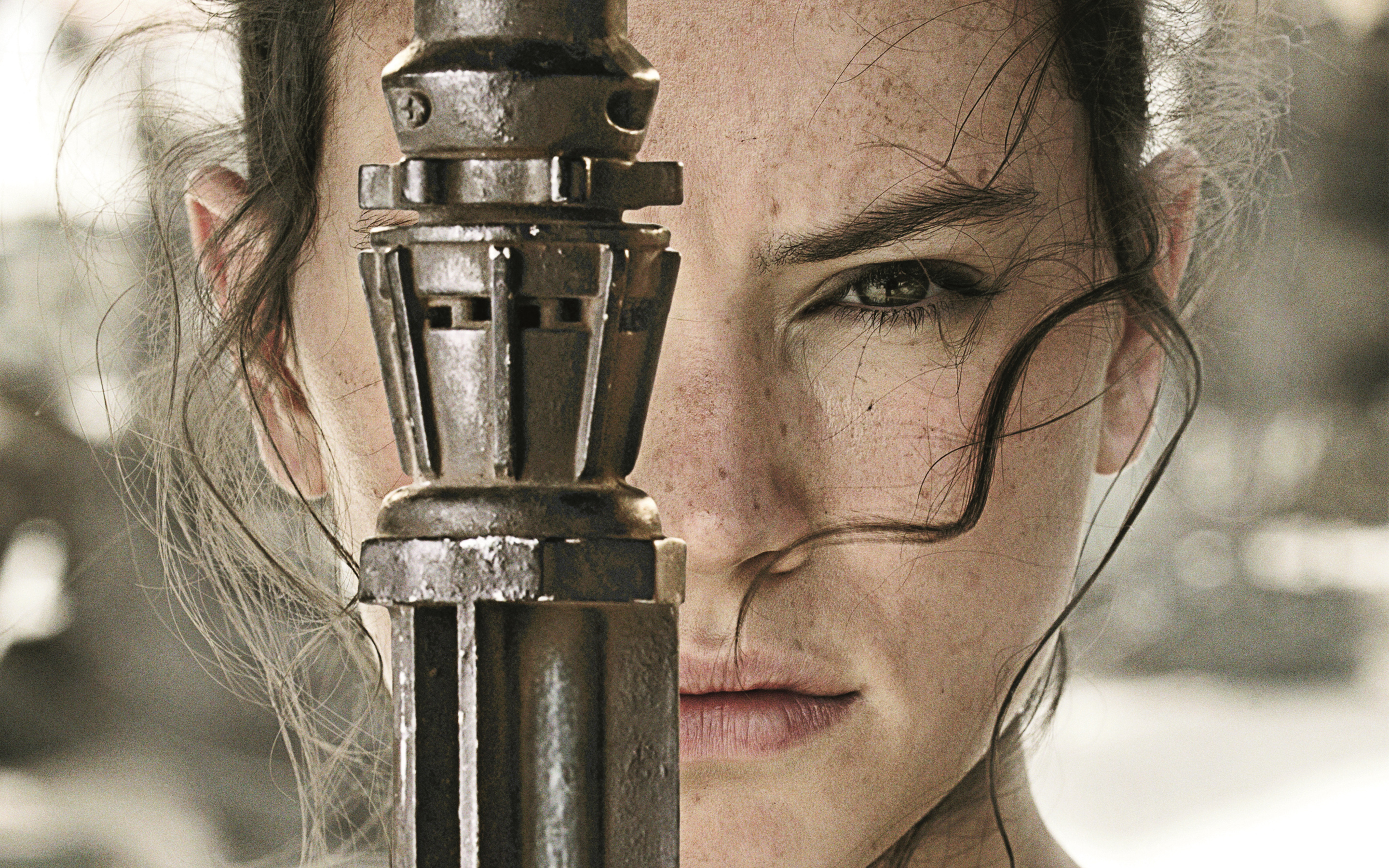 Daisy Ridley holding a lightsaber HD Wallpaper