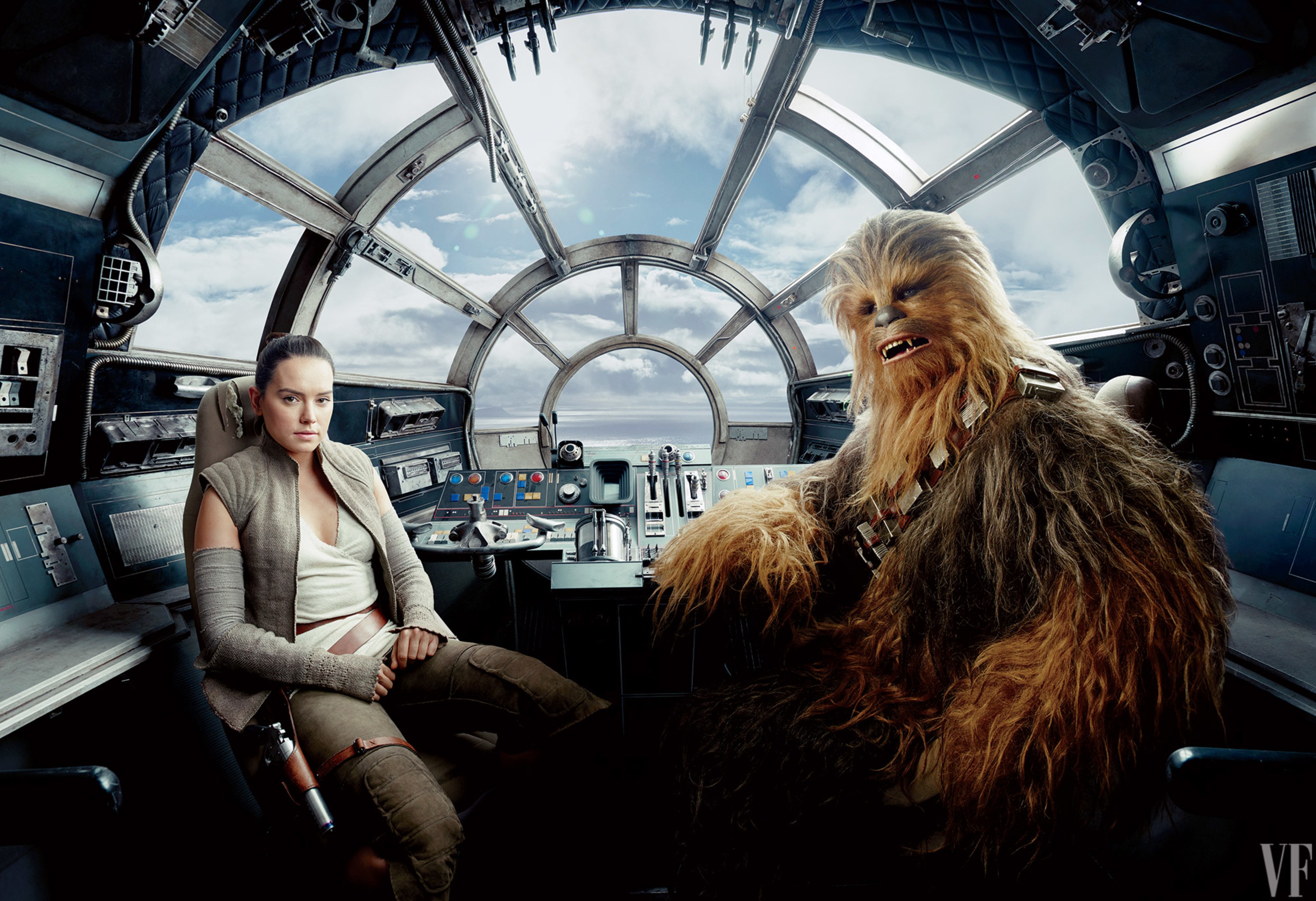 Daisy Ridley and Chewbacca in the Millennium Falcon cockpit HD Wallpaper