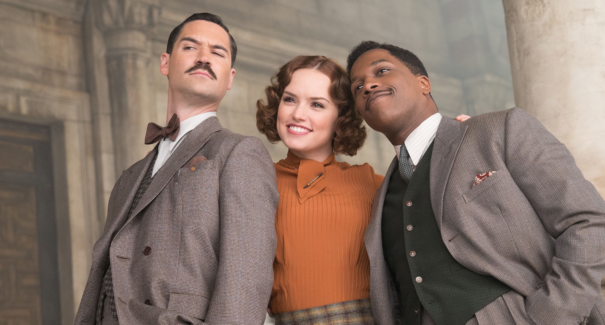 Daisy Ridley and two men in suits HD Wallpaper