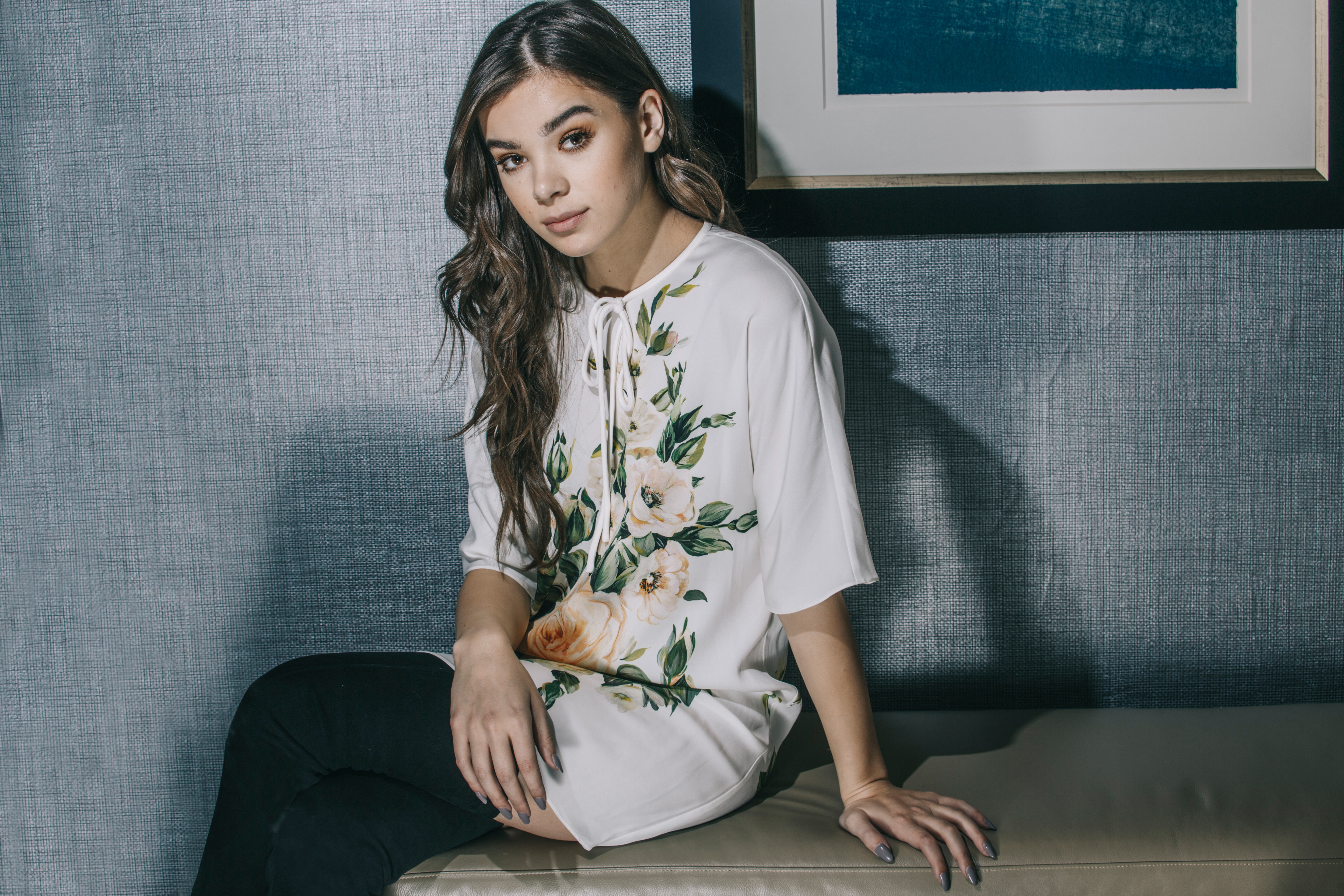 Hailee Steinfeld Sitting on Bench in Floral Top HD Wallpaper