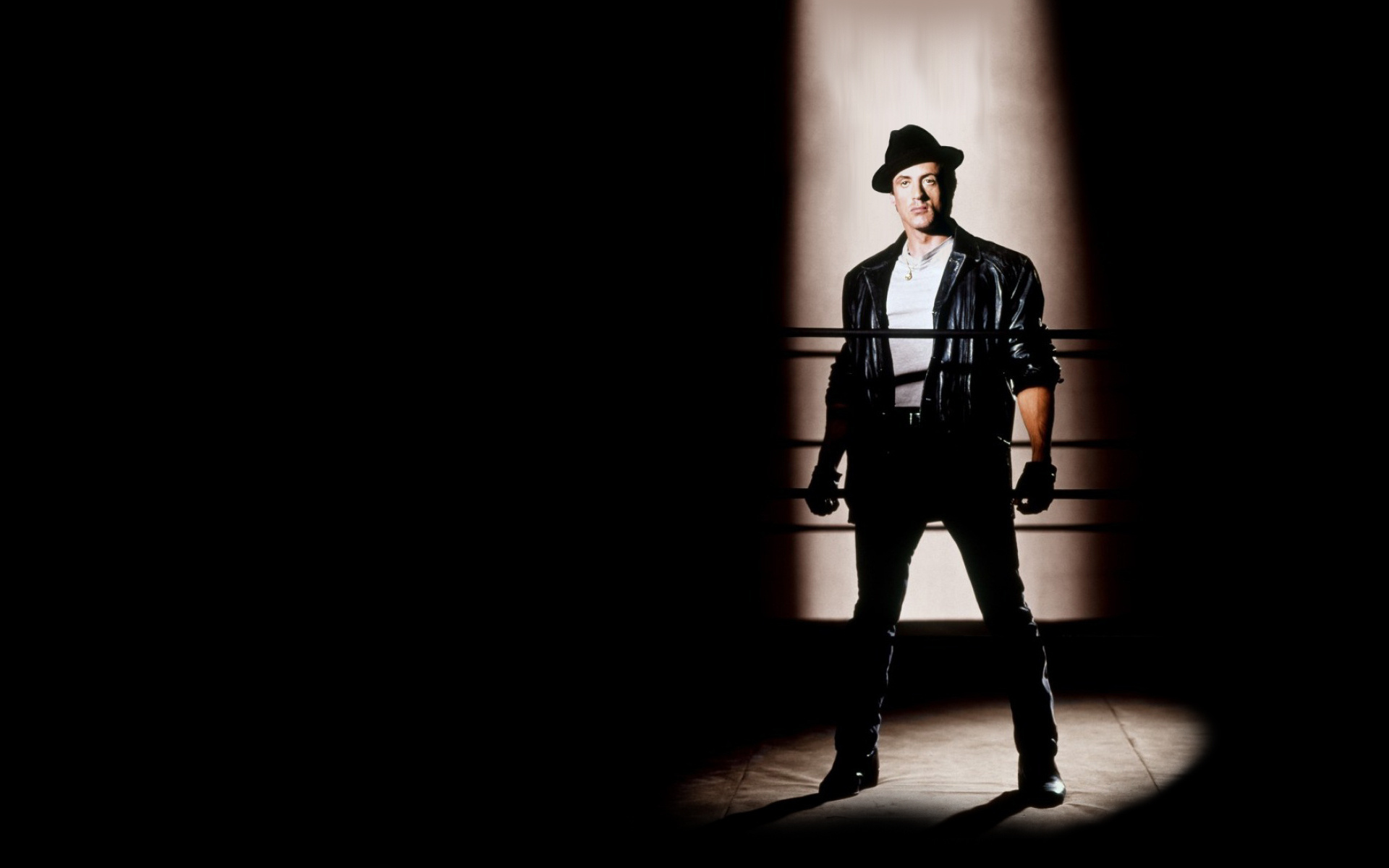 Sylvester Stallone as Rocky Balboa in a boxing ring HD Wallpaper