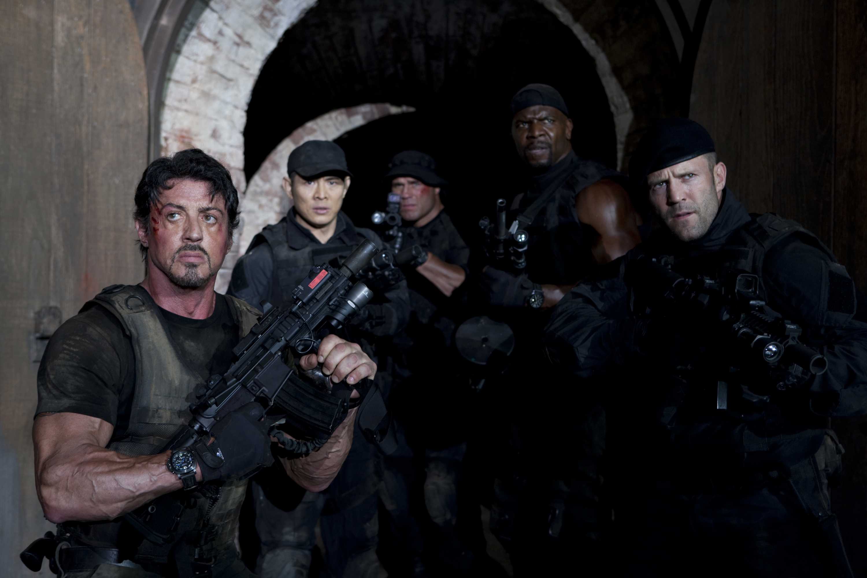 Sylvester Stallone and Expendables in a dark tunnel HD Wallpaper