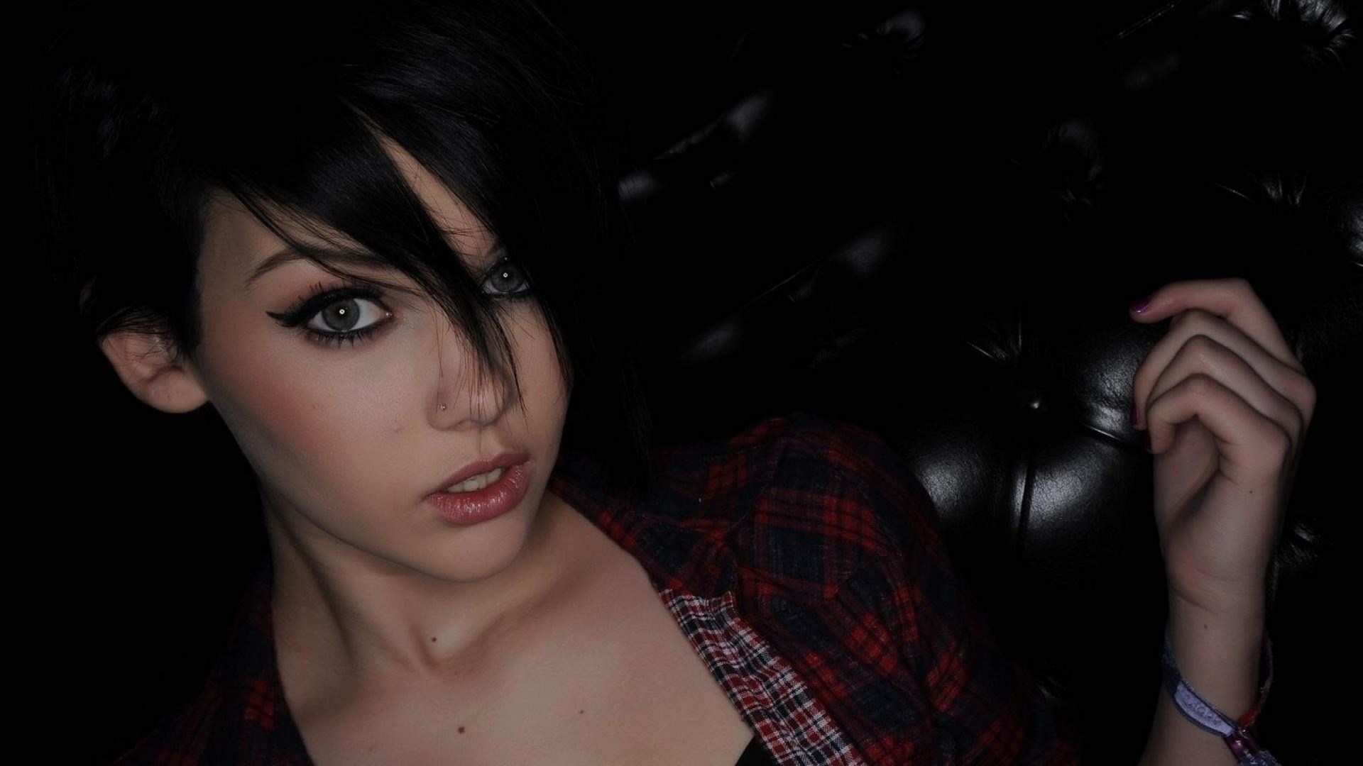 Woman with dark hair and plaid shirt HD Wallpaper
