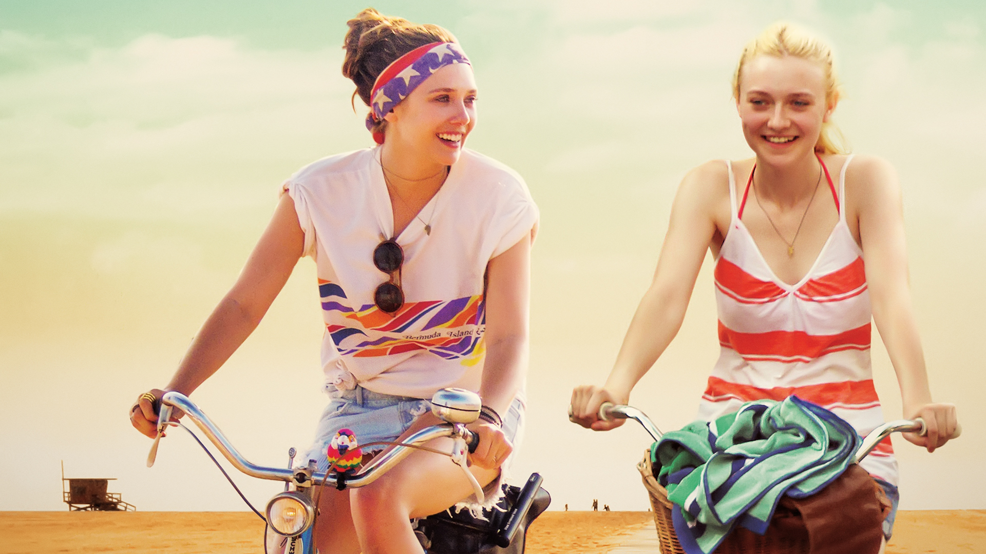 Dakota Fanning and Elizabeth Olsen on bicycles HD Wallpaper