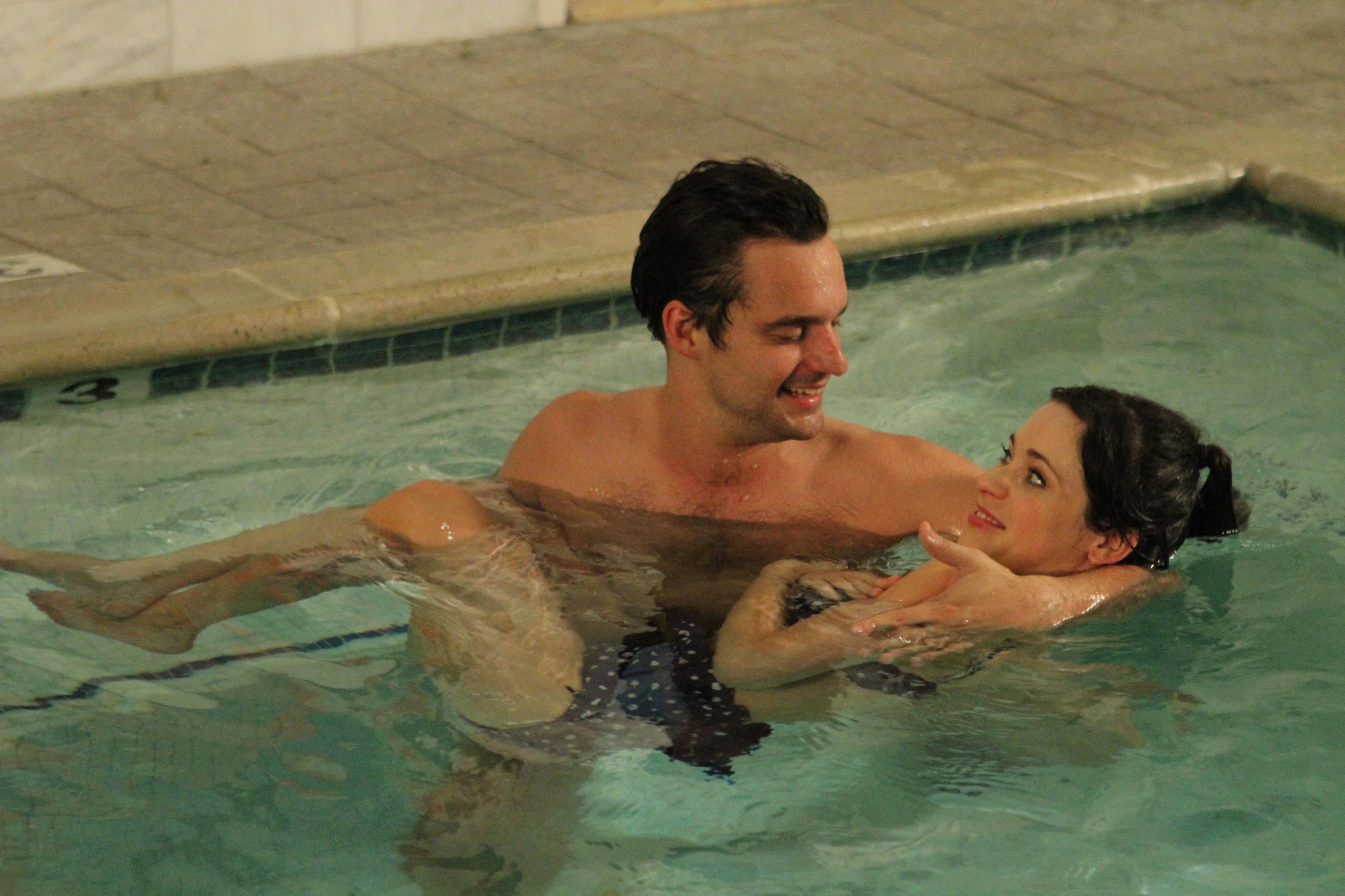 Jake Johnson in a swimming pool HD Wallpaper