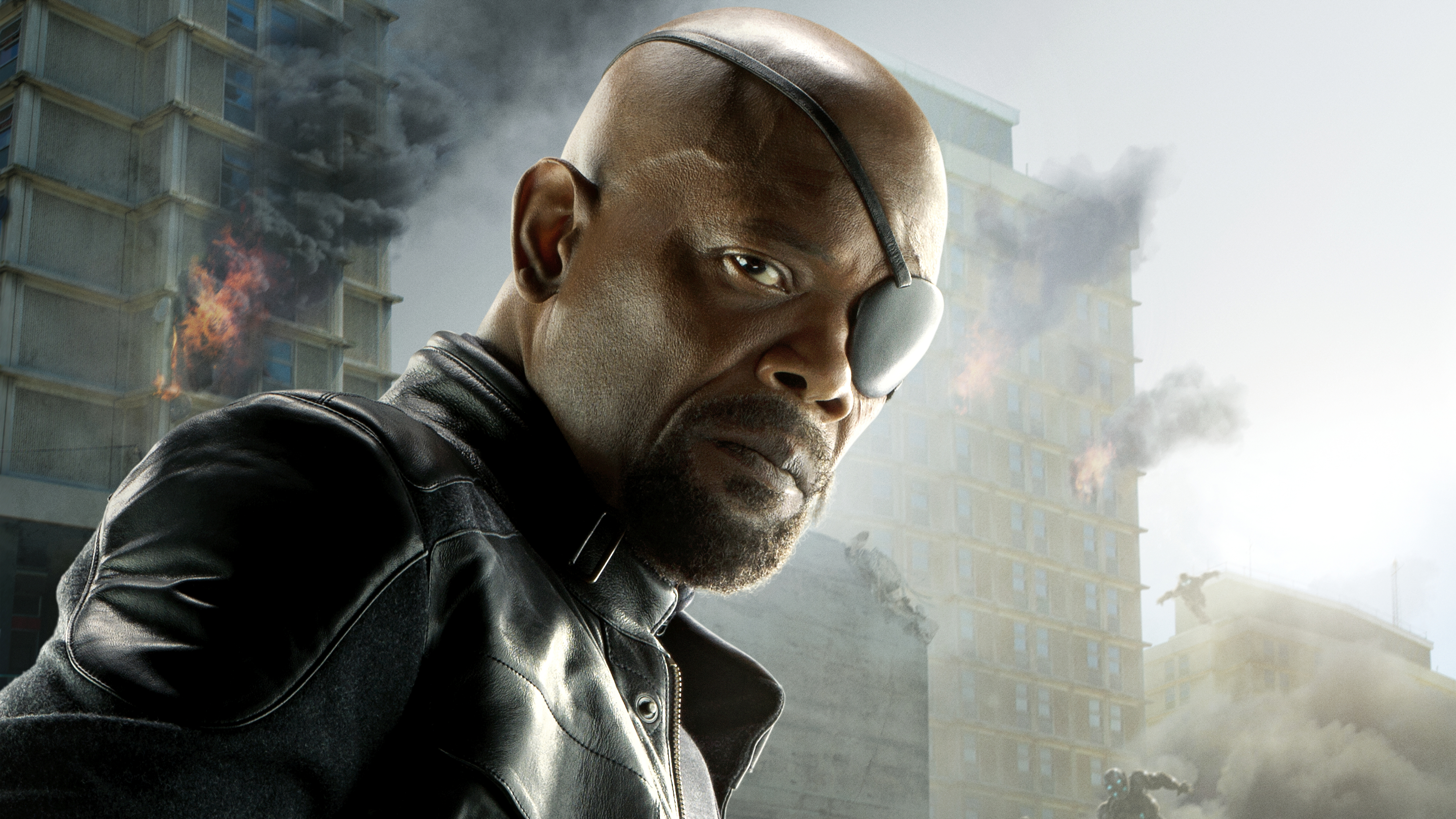 Samuel L. Jackson as Nick Fury in a burning city HD Wallpaper
