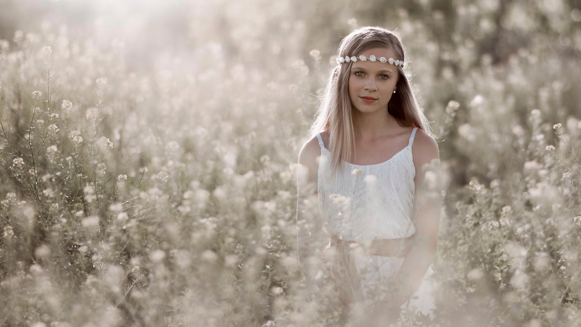 Girl with flower crown in a field of flowers HD Wallpaper